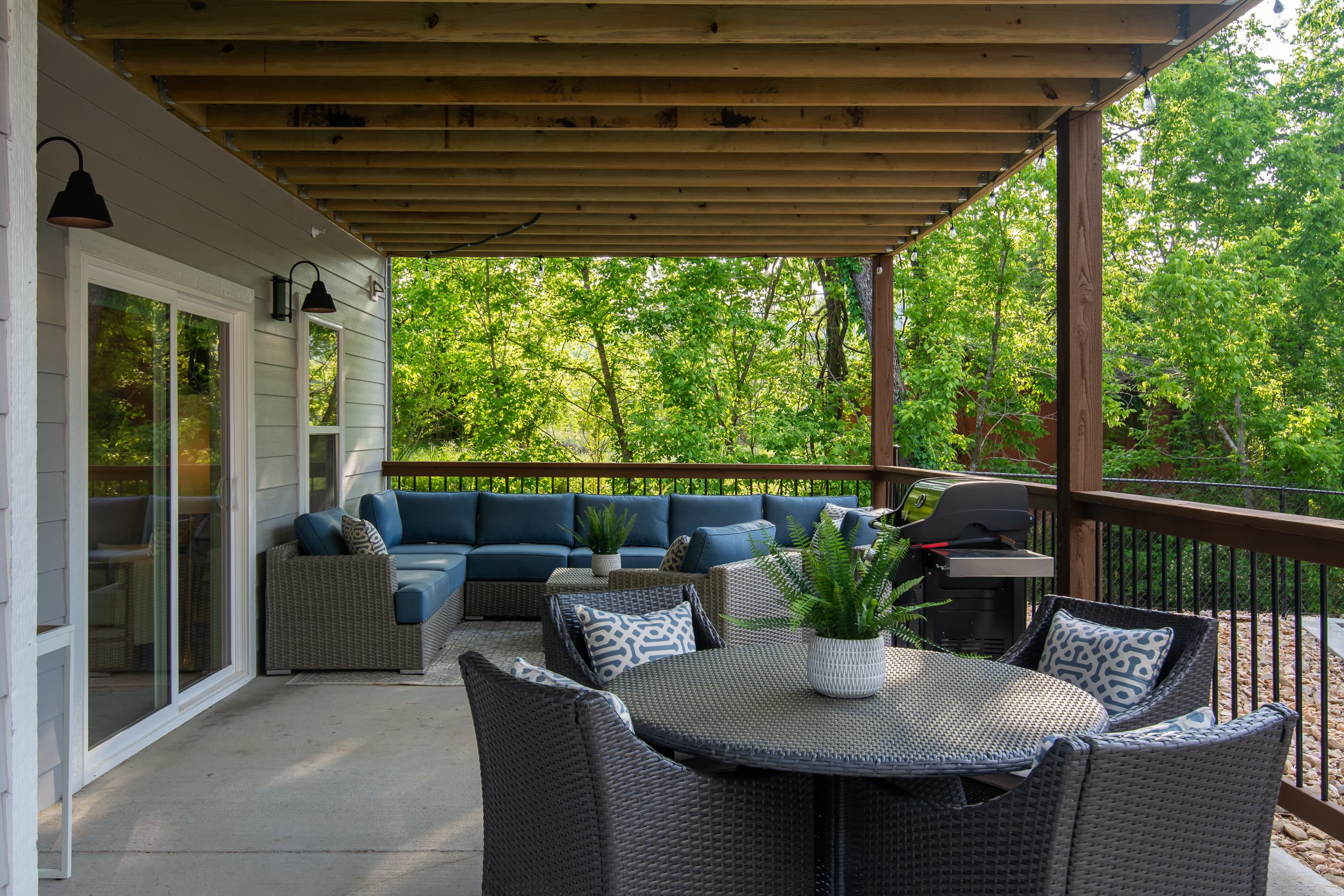 Main level patio with BBQ grill and ample seating for the whole family
