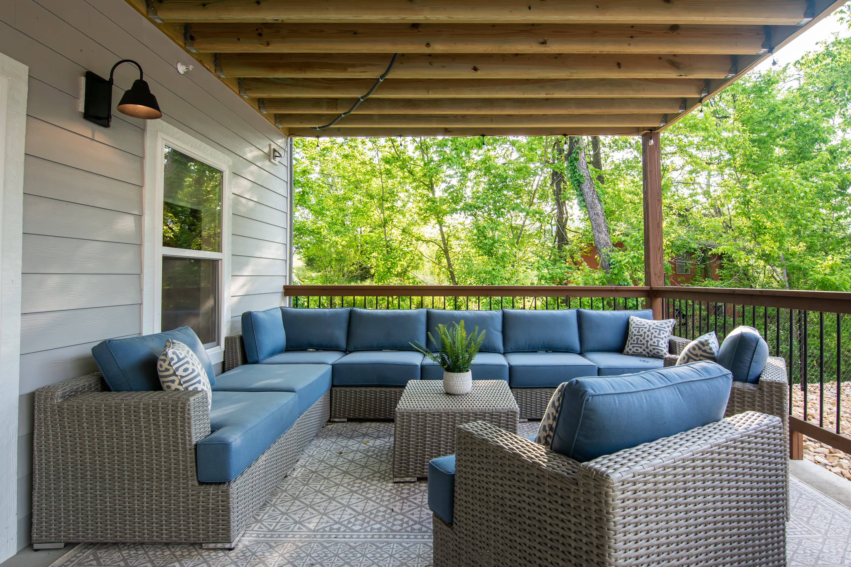 Main level patio with BBQ grill and ample seating for the whole family