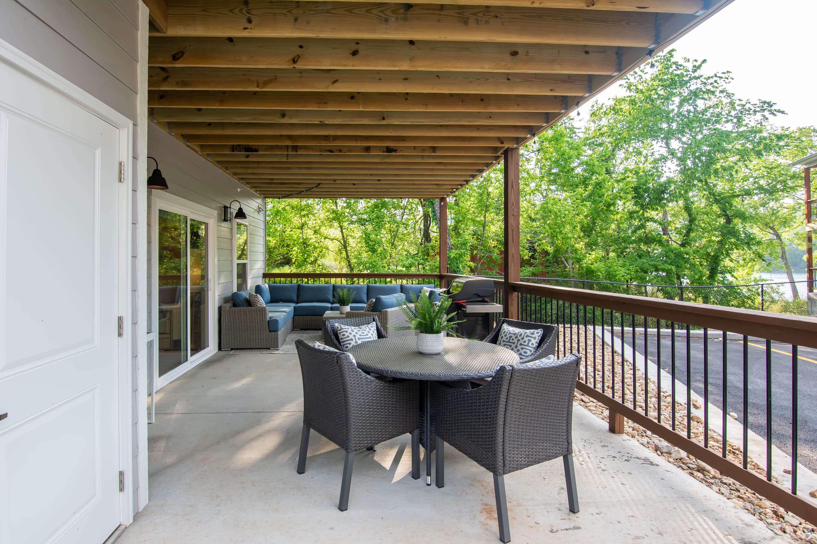 Main level patio with BBQ grill and ample seating for the whole family