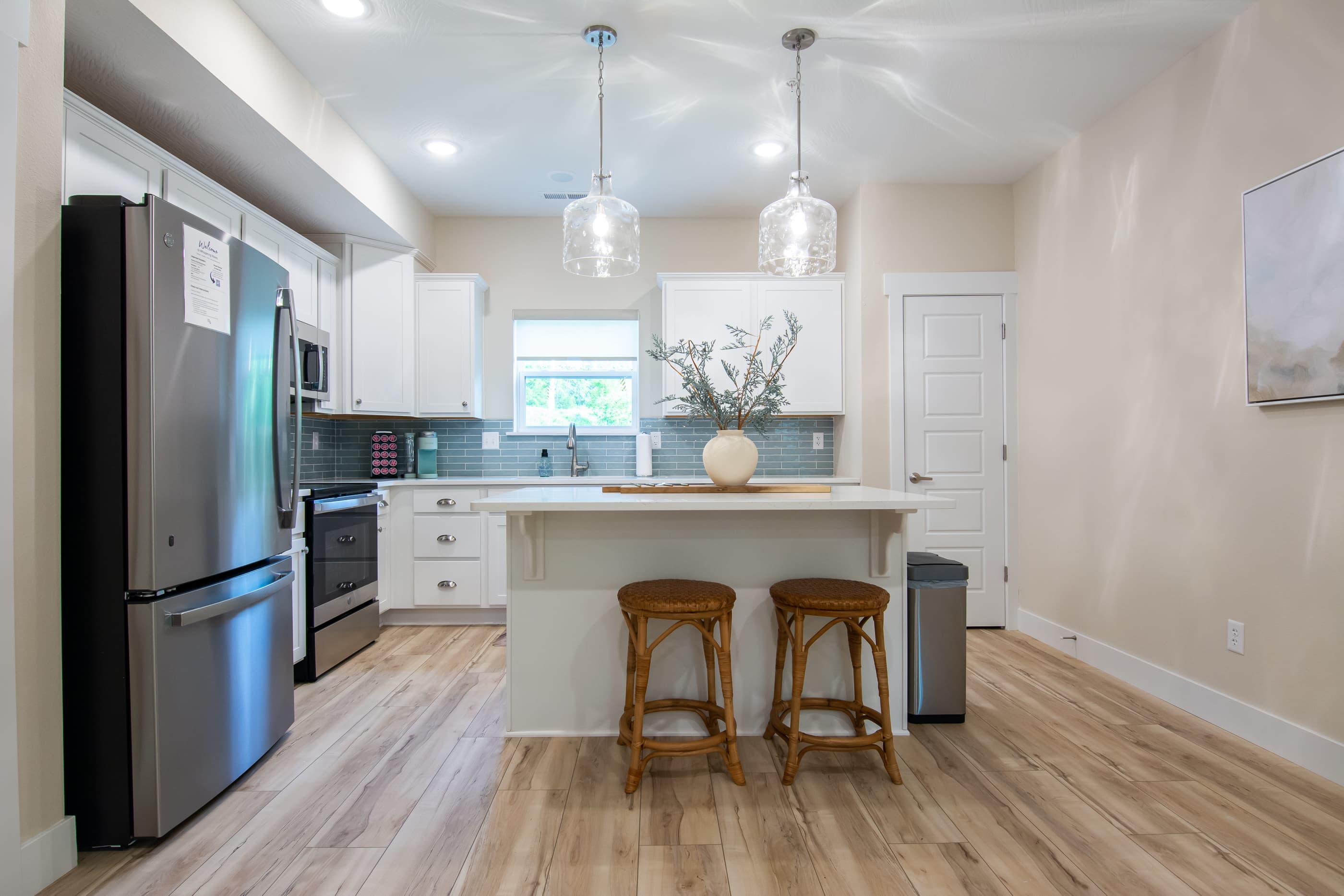 Kitchen with open concept and large island that has plenty of space to prep and cook!