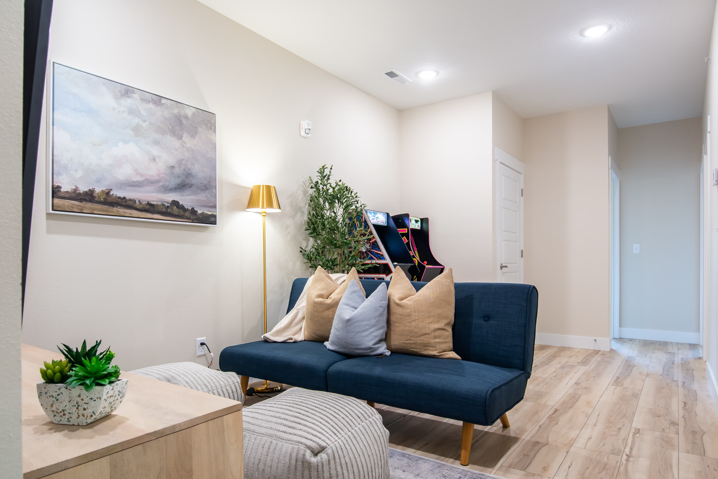 Upper level family/game room with comfy seating area