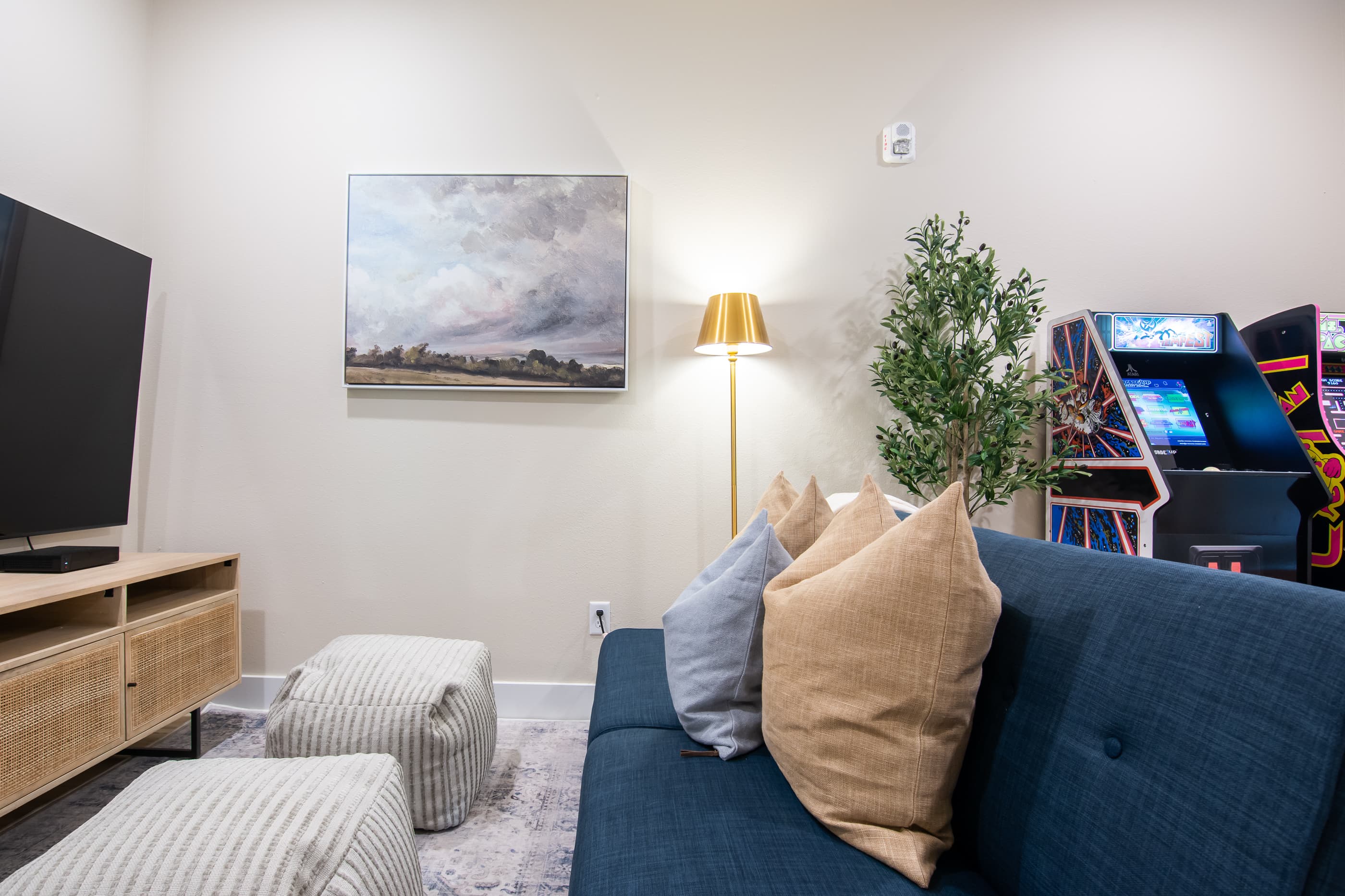 Upper level family/game room with comfy seating area