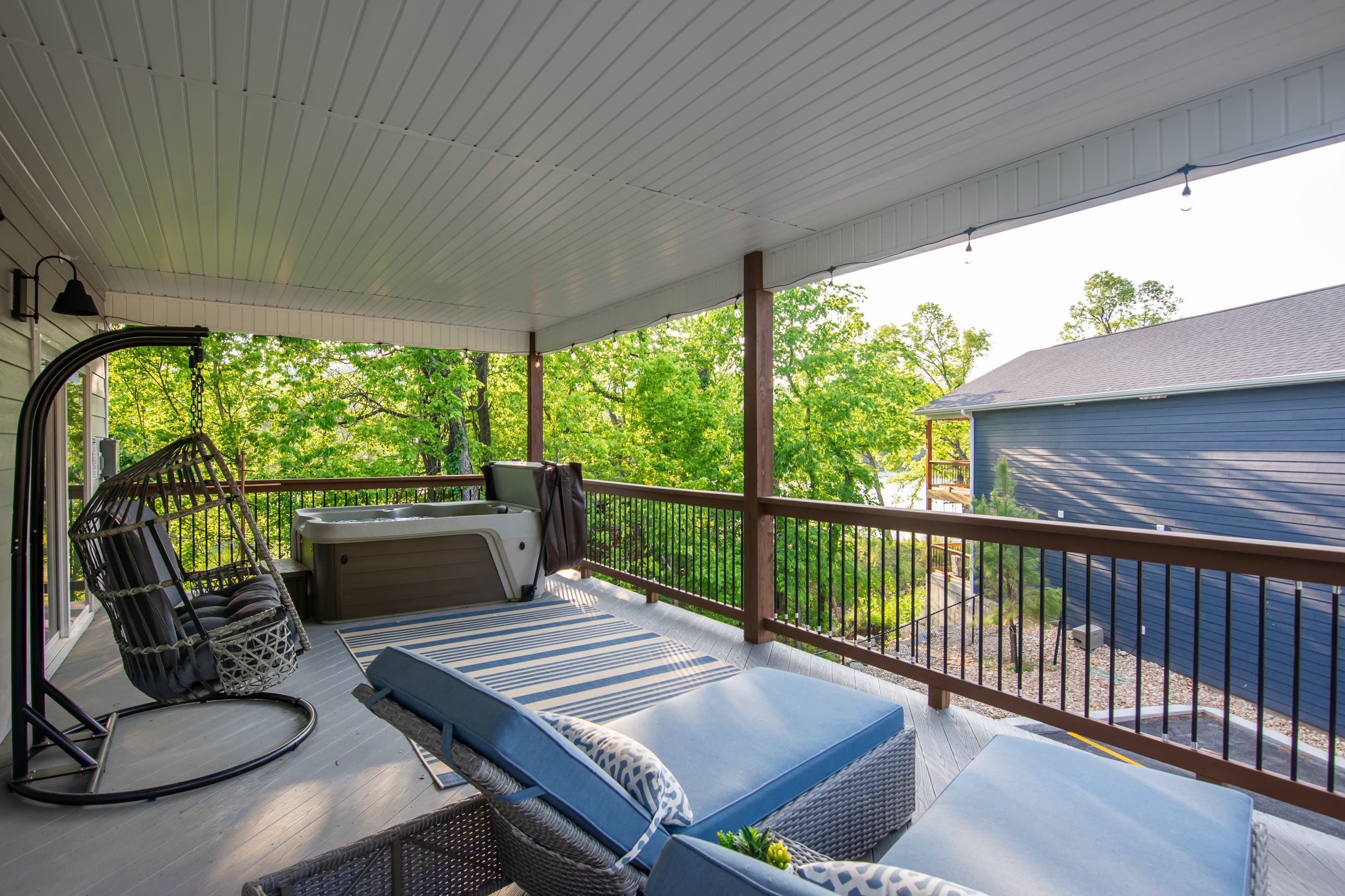Upper level deck with hot tub and beautiful views