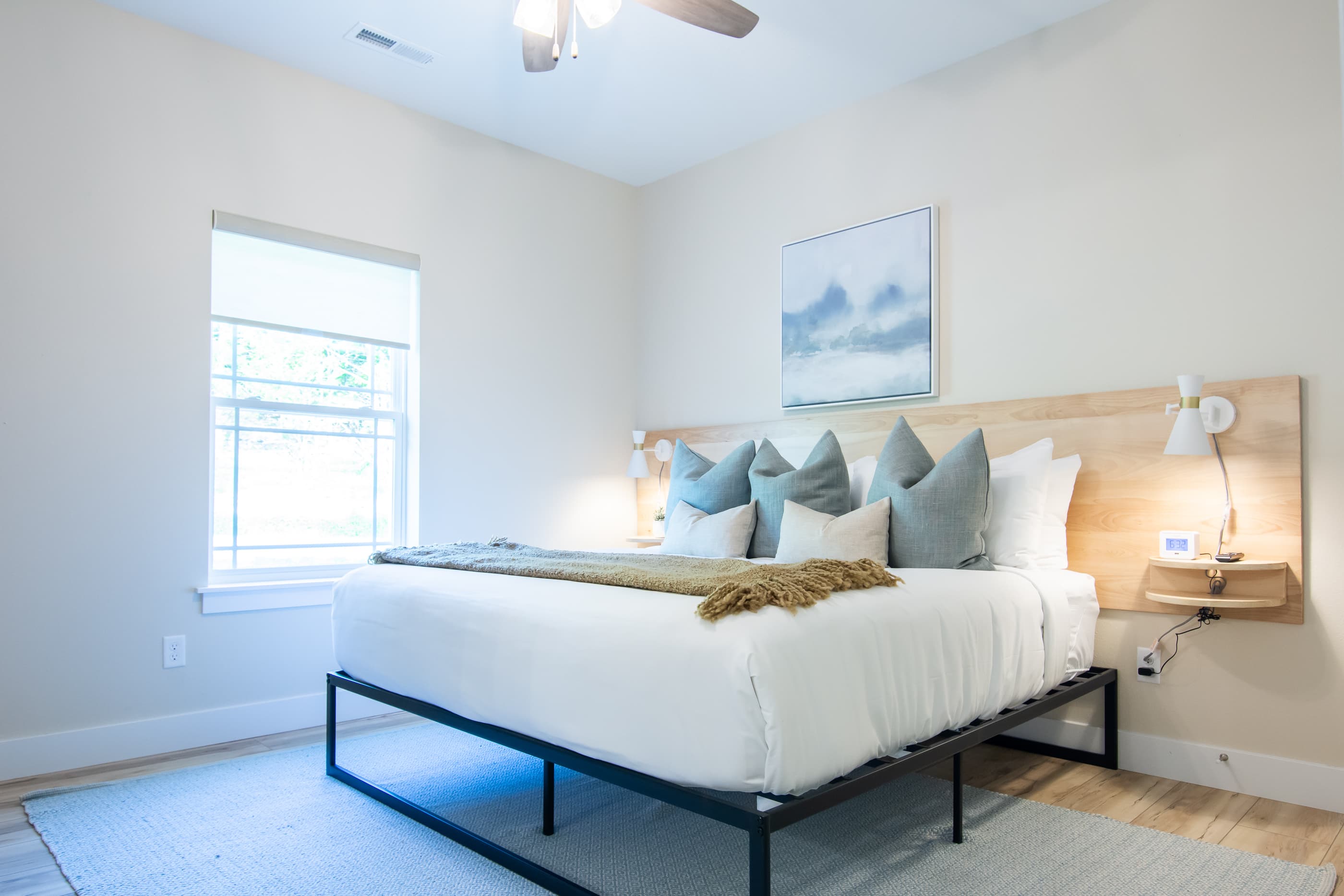 Upper level king bedroom with an abundance of space around each side of the bed