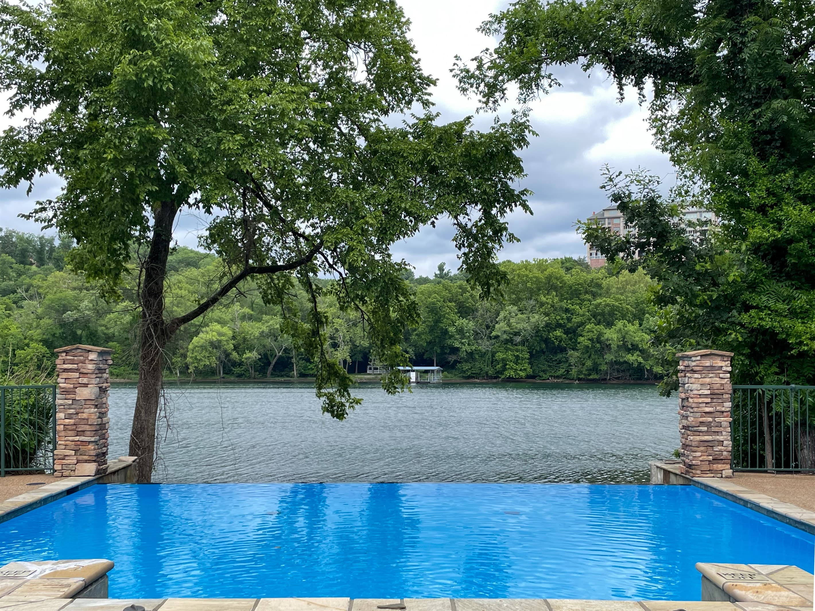 Neighborhood outdoor pool with stunning Lake Taneycomo view