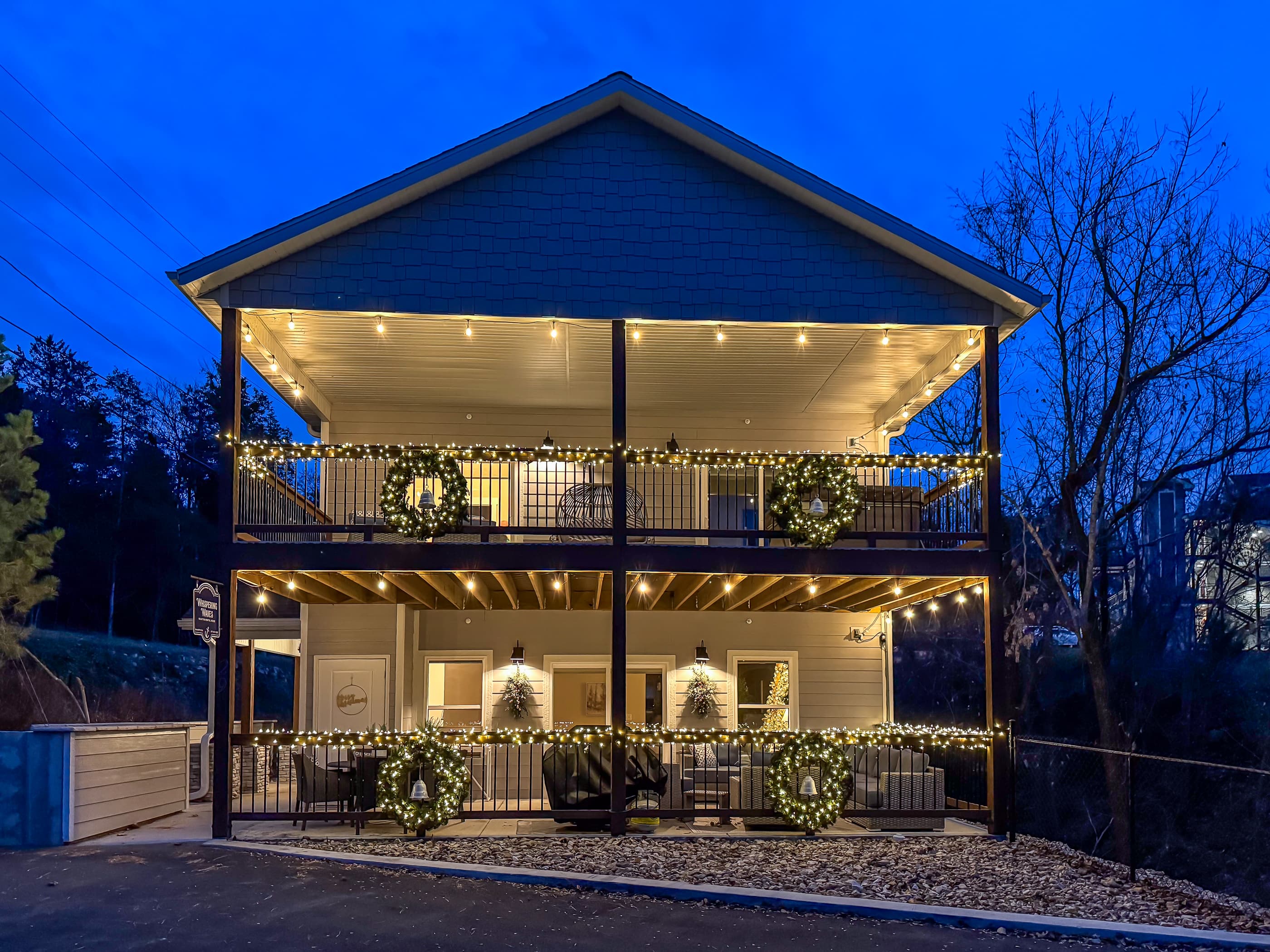 Outdoor upper and lower level deck and a sprinkle of lights to set the holiday mood!