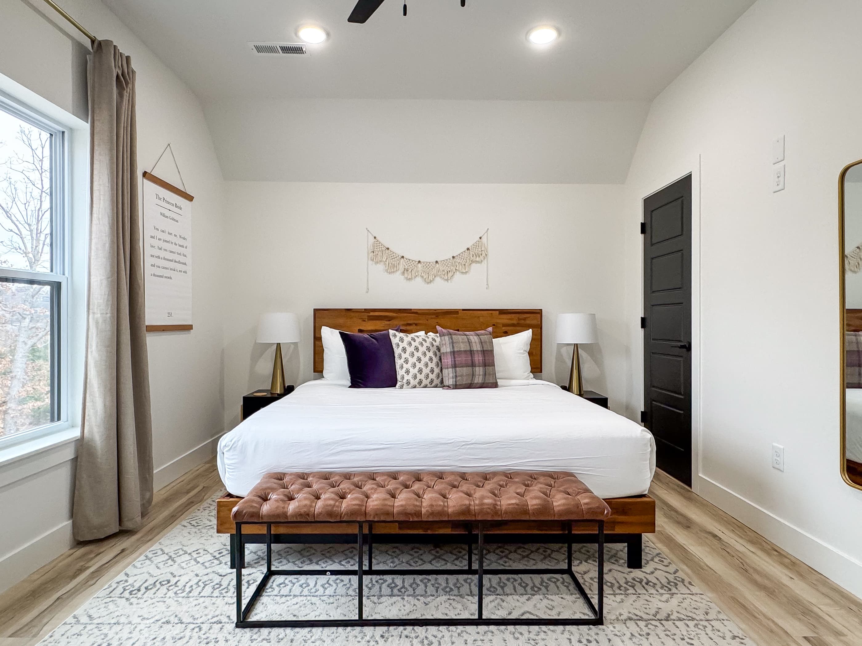 Upper level king bed with ample space around the bed