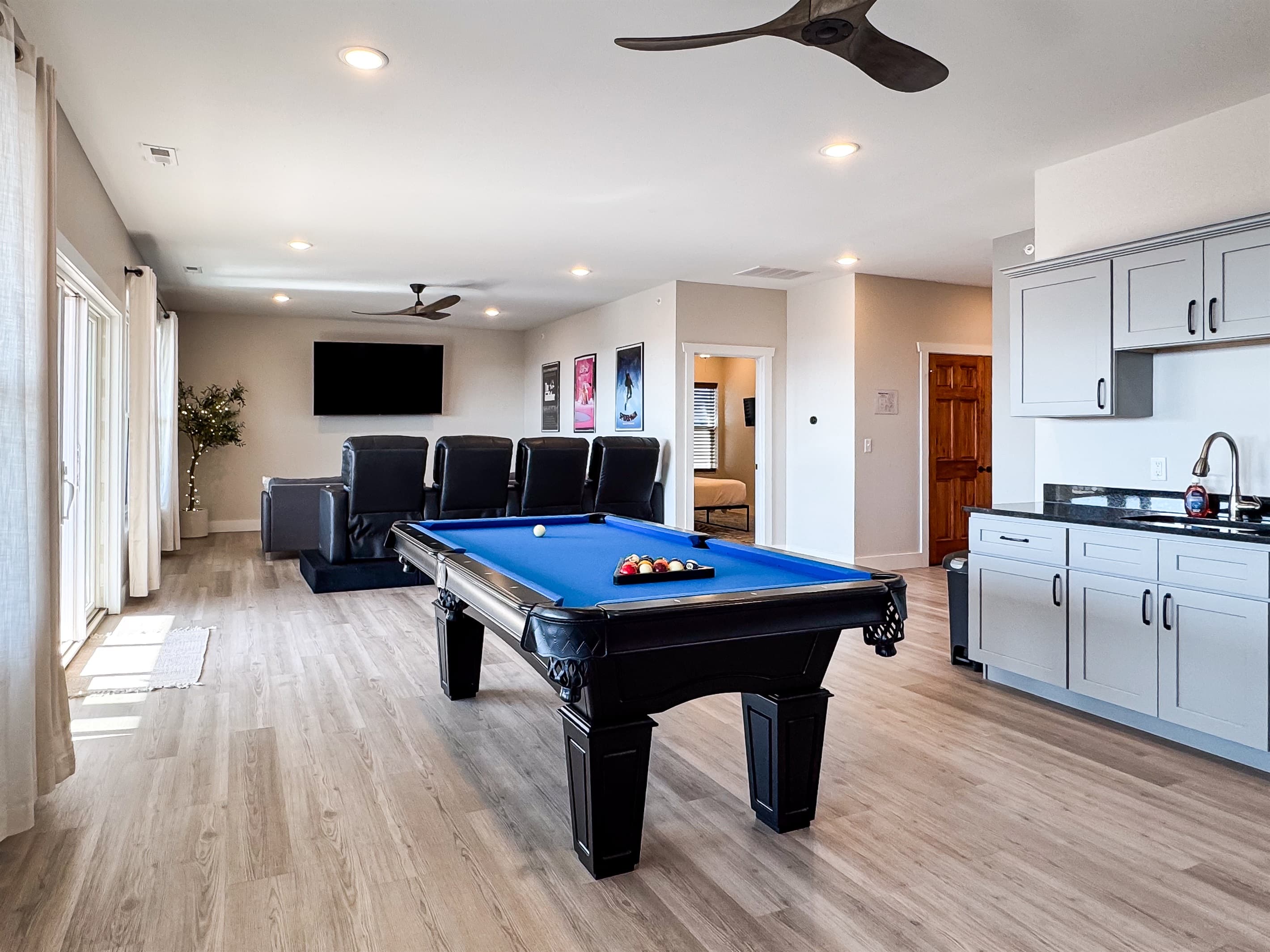 Game Room- Full sized fridge and wet bar helps cut down on the lower level kitchen drink/snack trips