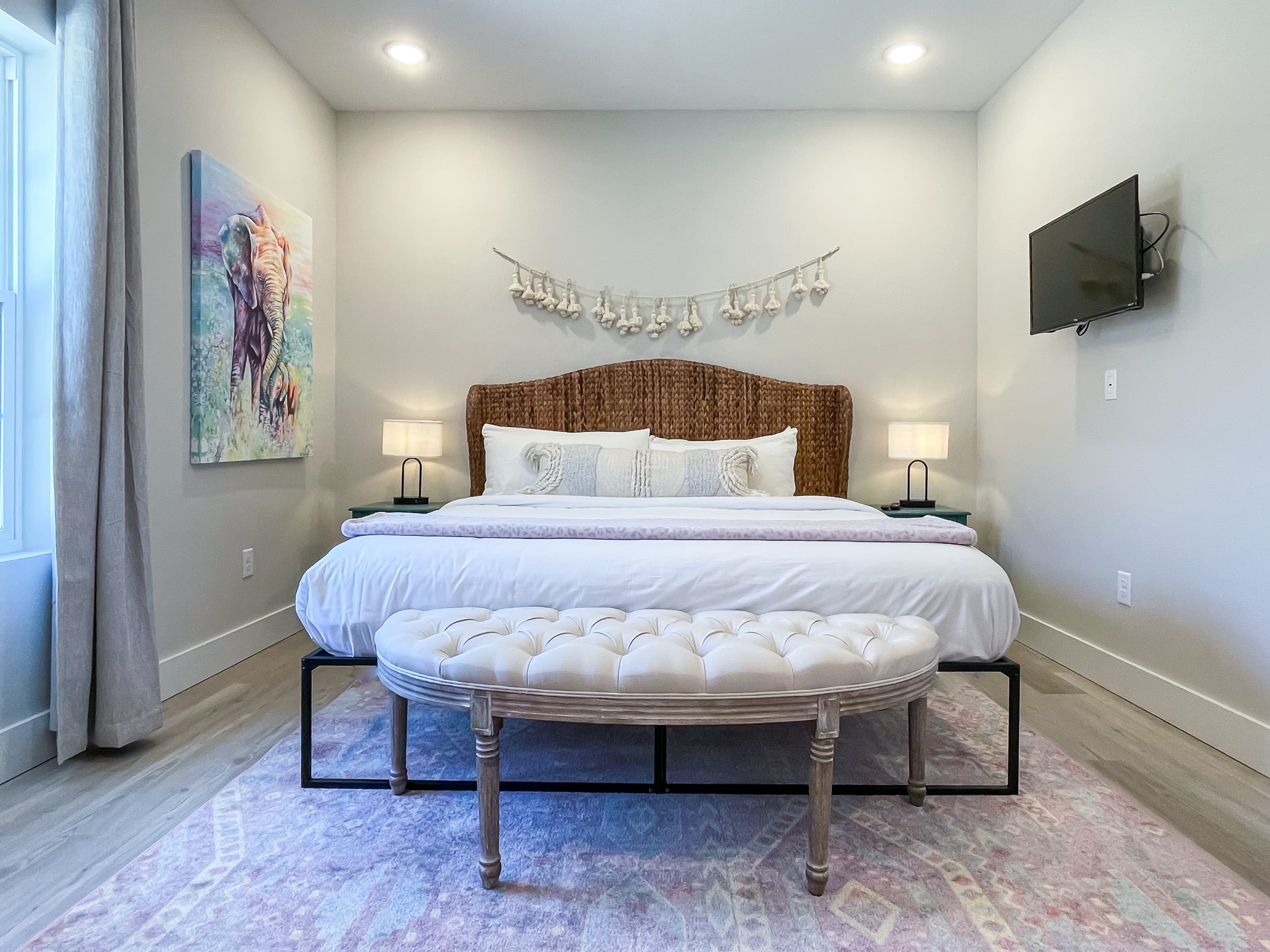 Bedroom 3 with a massive king size bed, en suite bathroom, and TV