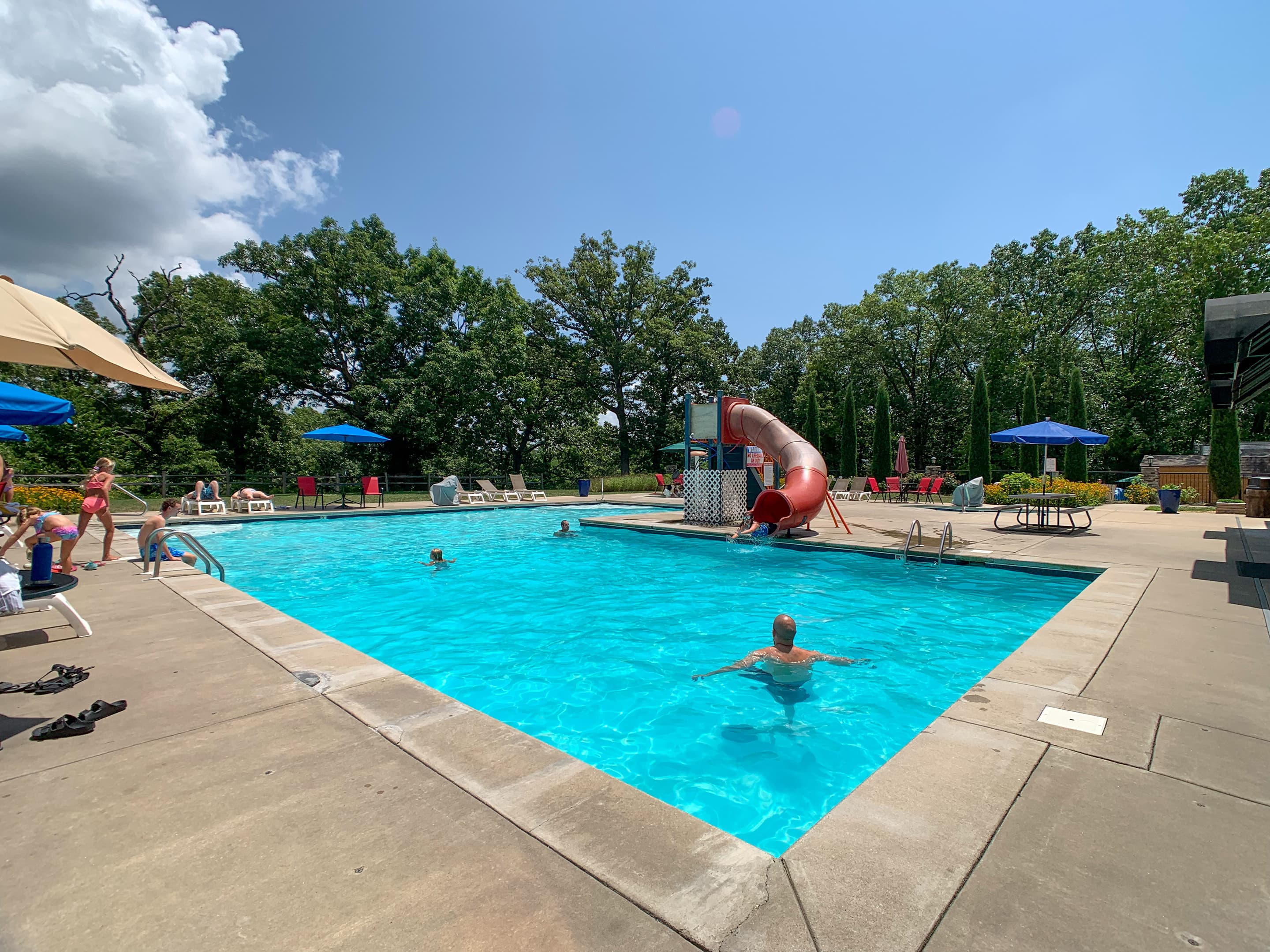 Neighborhood outdoor pool up the hill.
