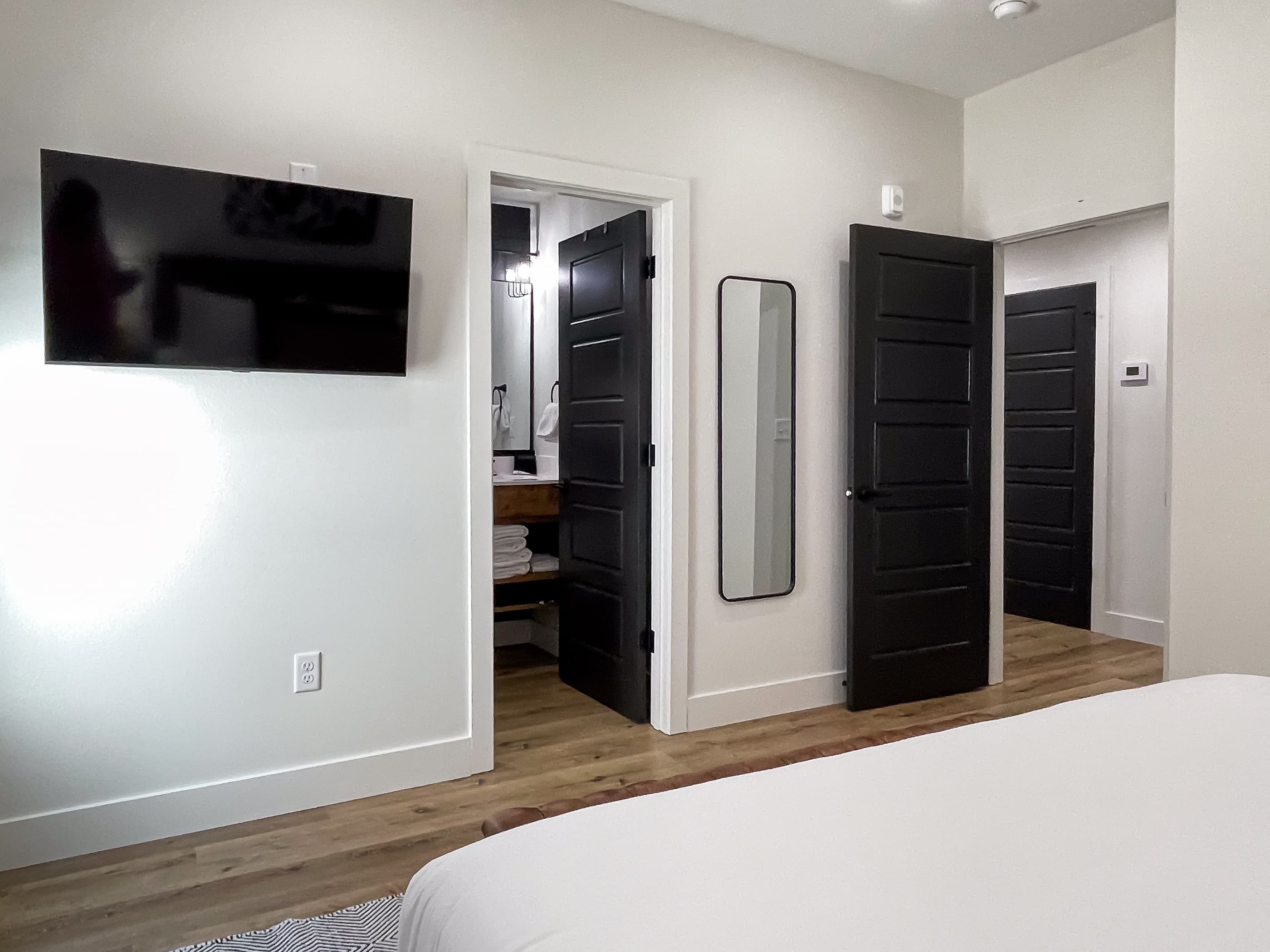 Bedroom 3: Tv, full length mirror, and en-suite bathroom