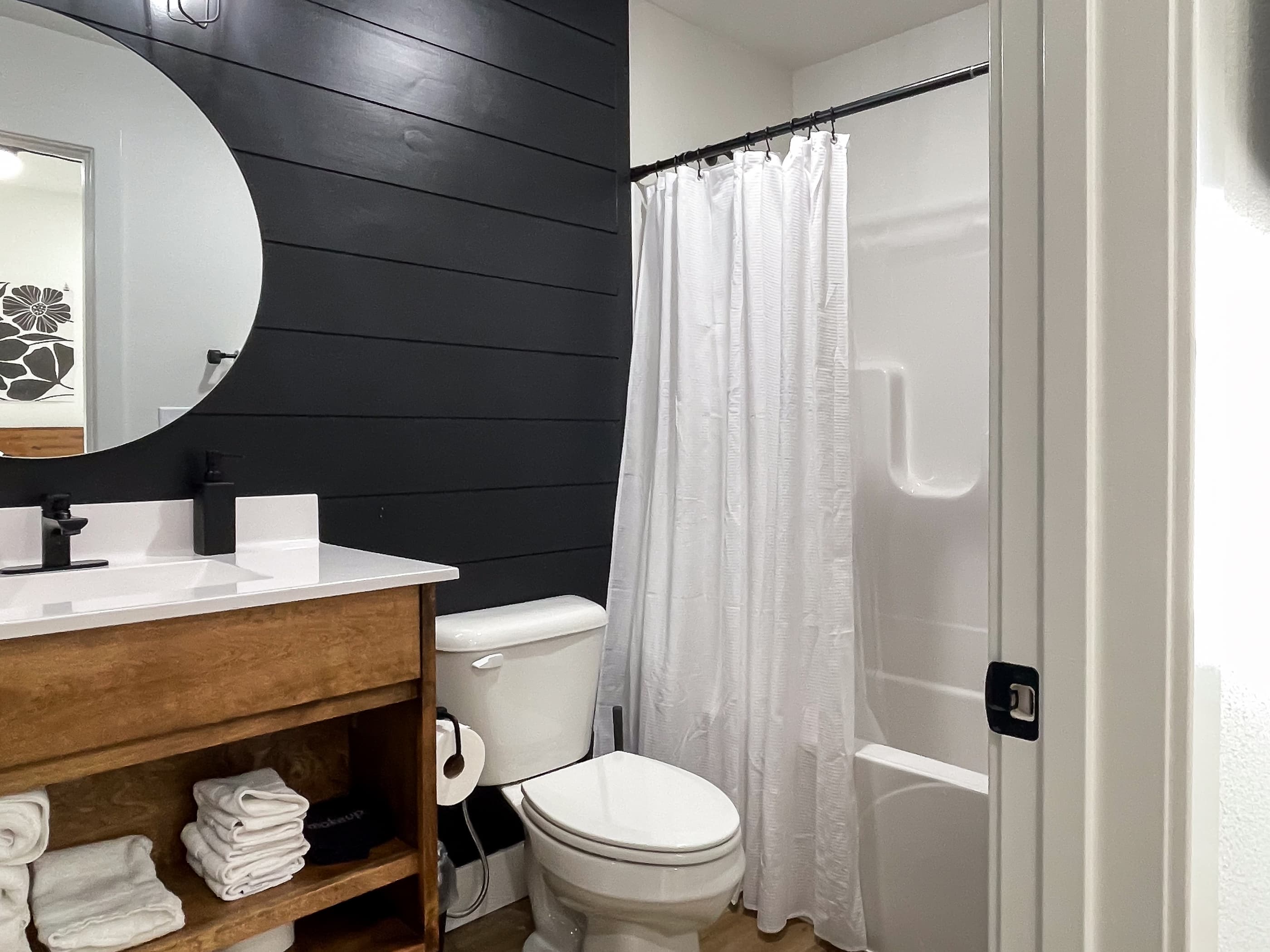 Bedroom 4: En-suite with tub shower, toilet, and vanity