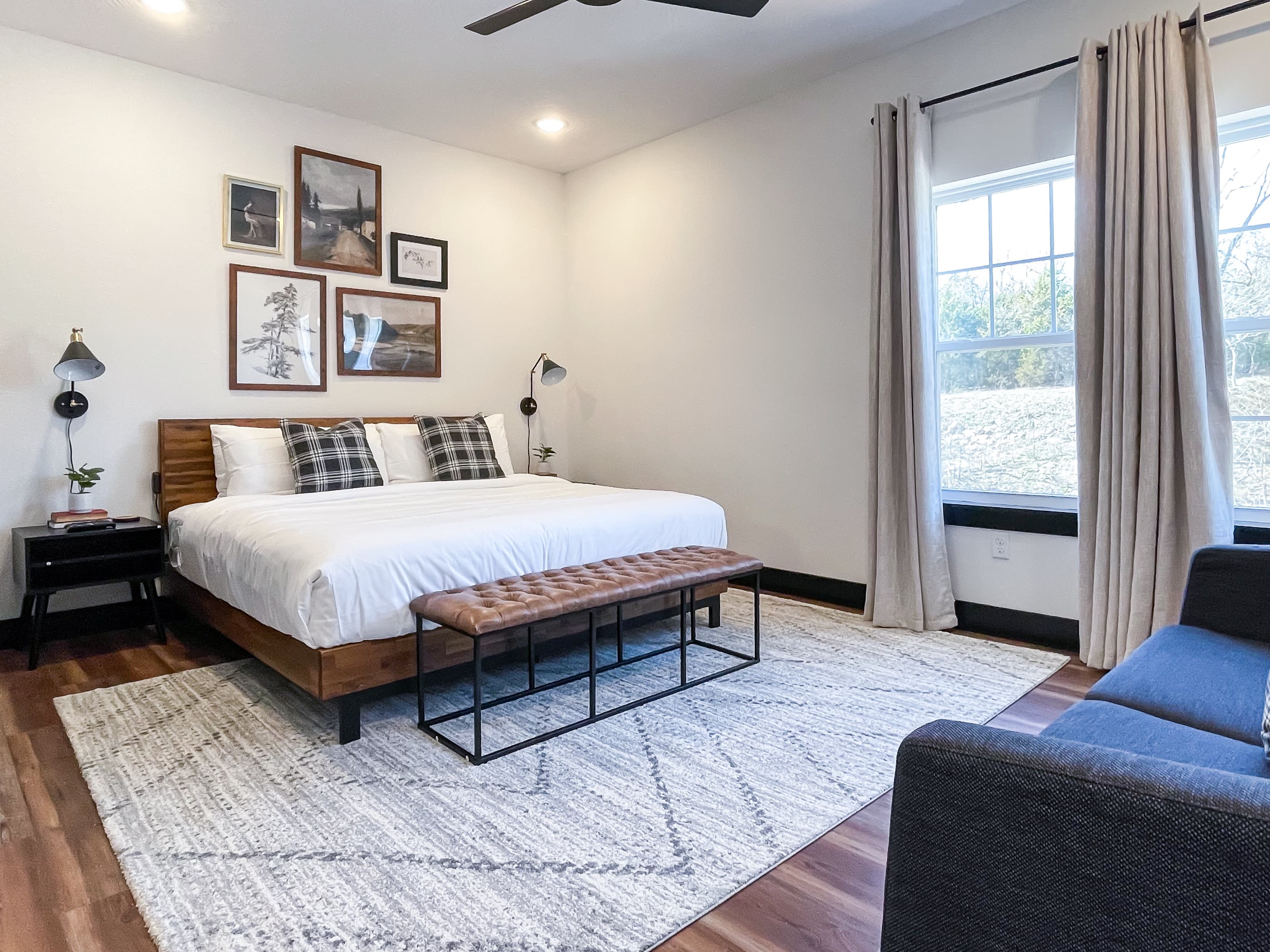 Upper level bedroom with spacious king bed and queen sleeper sofa