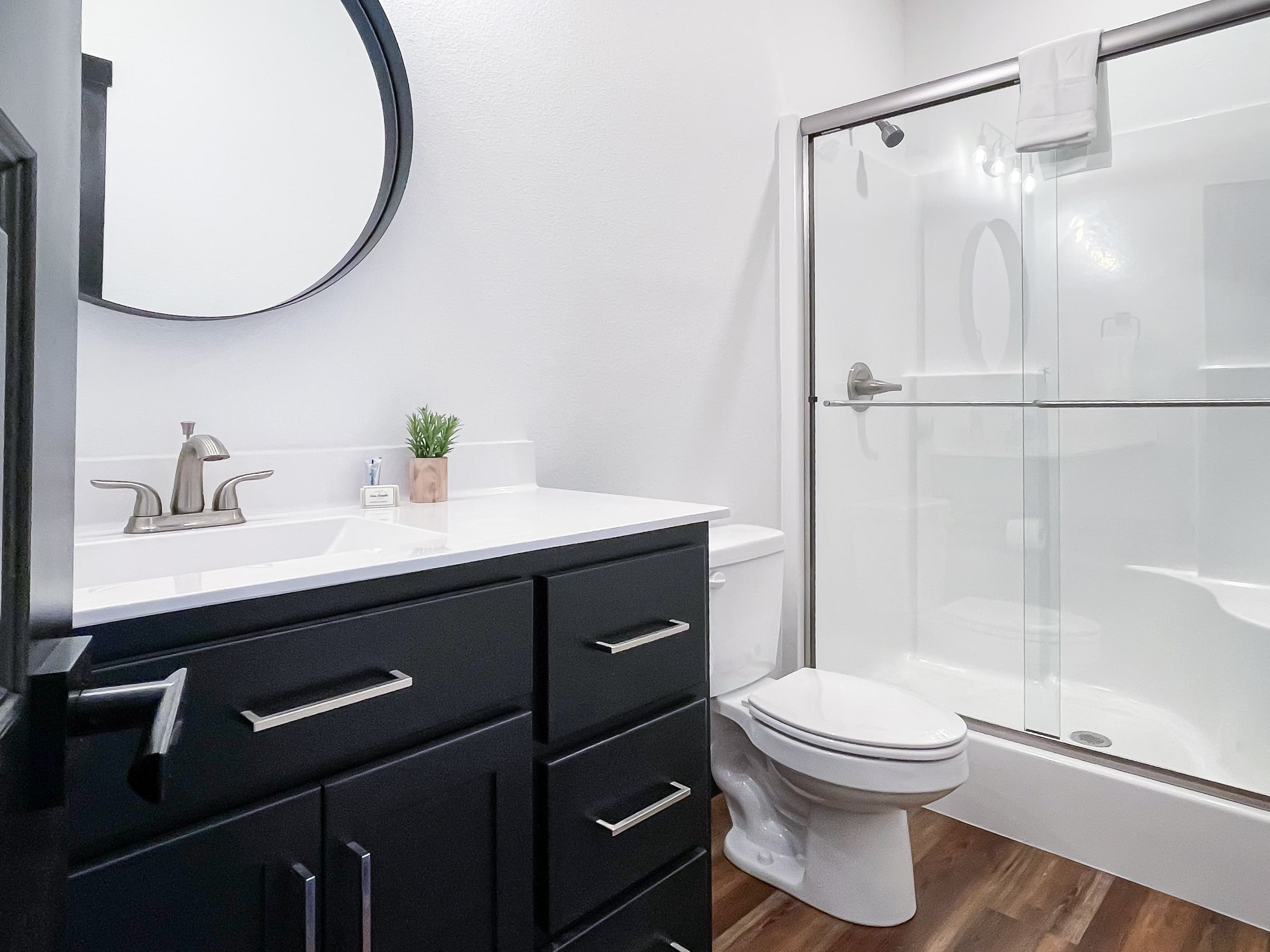 Upper level en suite bathroom with step in shower