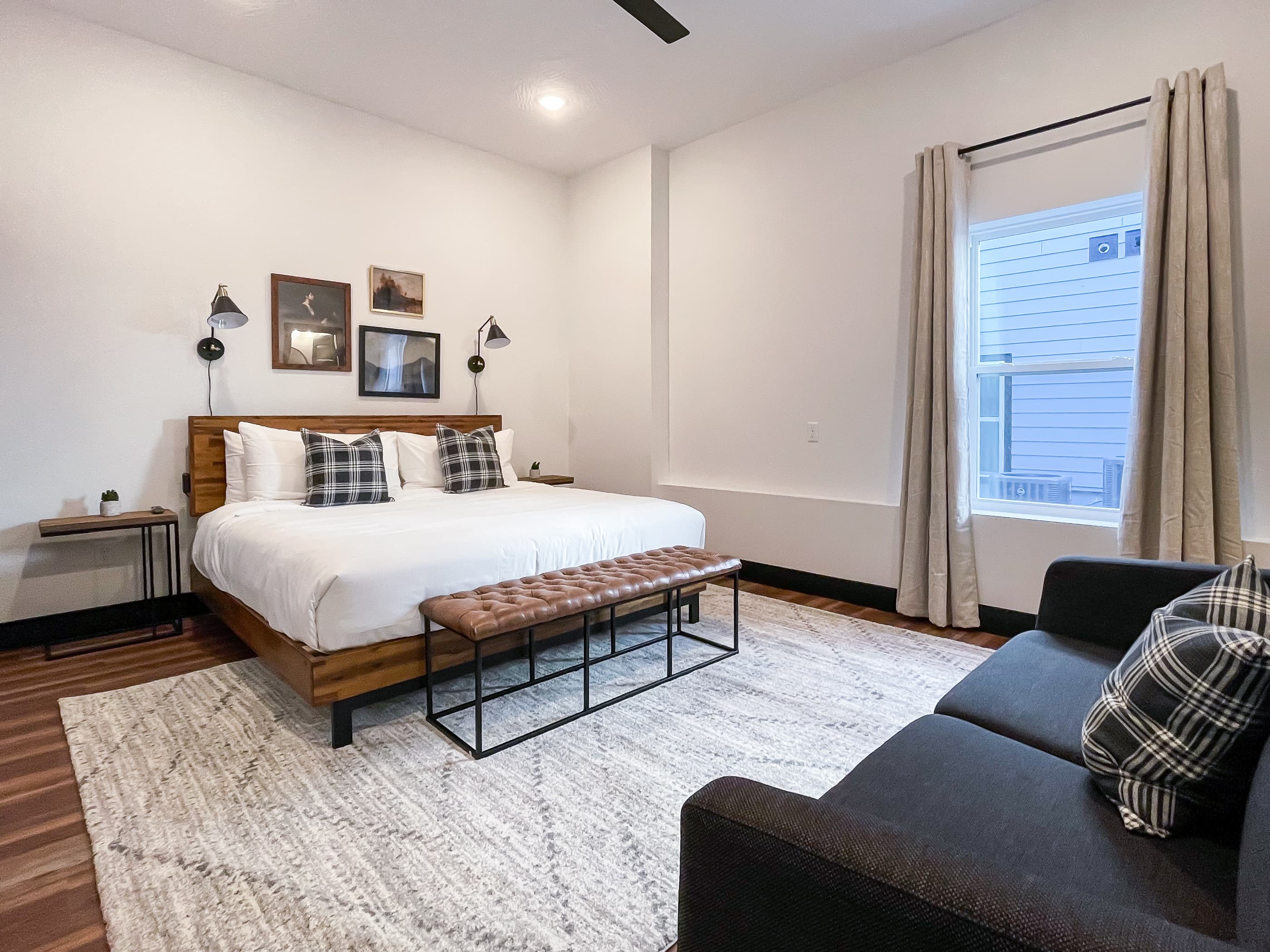 Lower level spacious bedroom with king bed and queen sleeper sofa