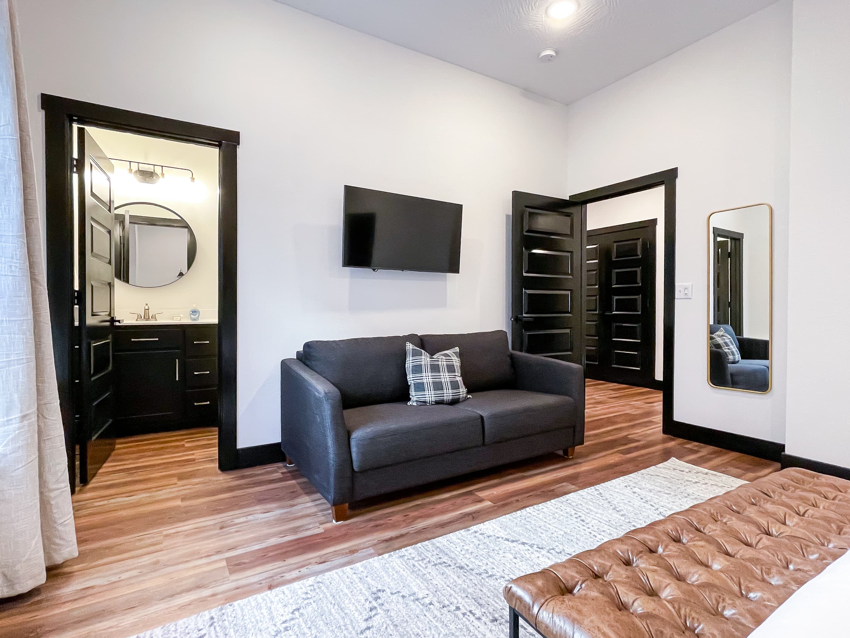 Lower level spacious bedroom with queen sleeper sofa and en suite bathroom