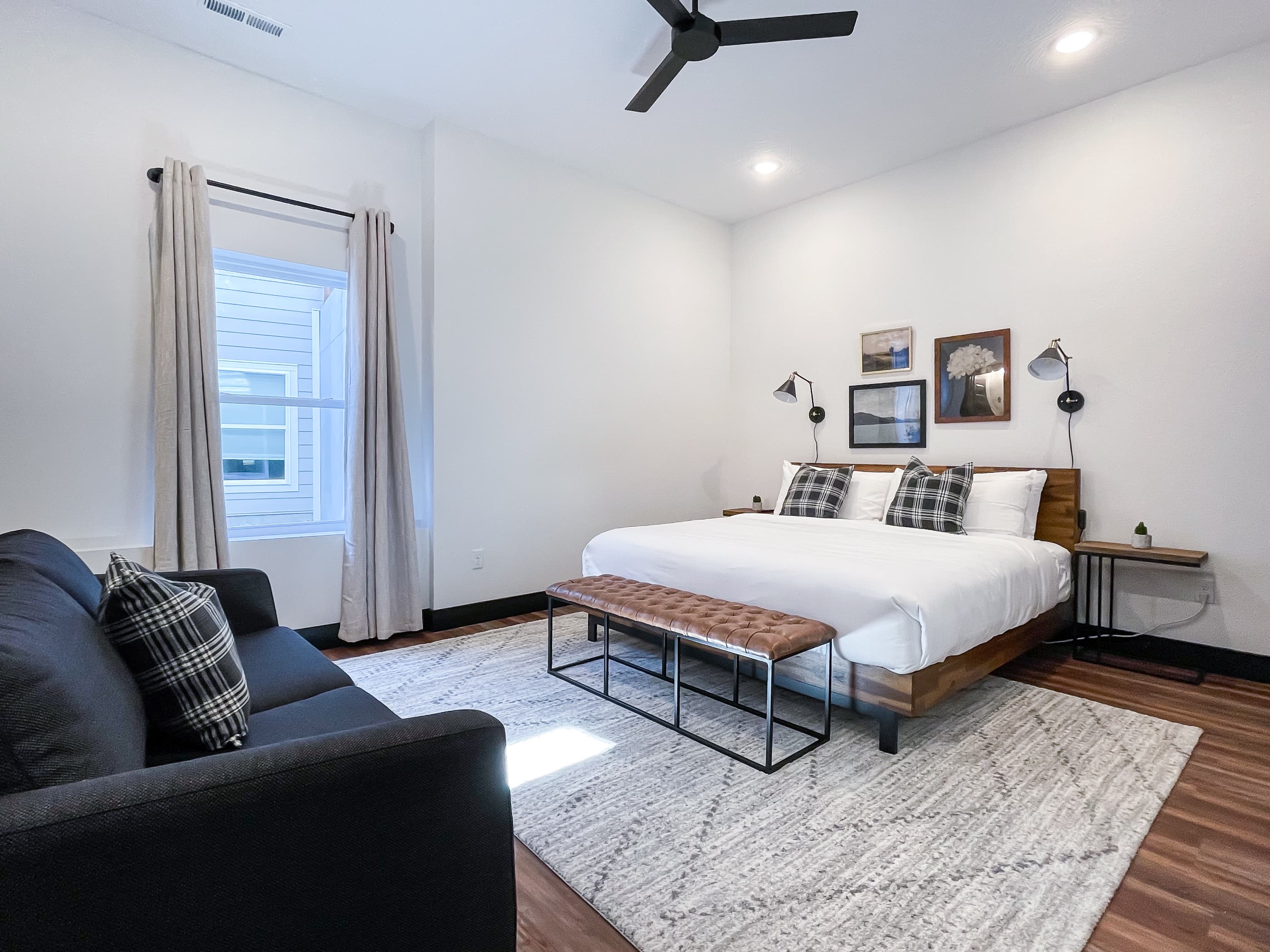 Lower level spacious bedroom with king bed and queen sleeper sofa