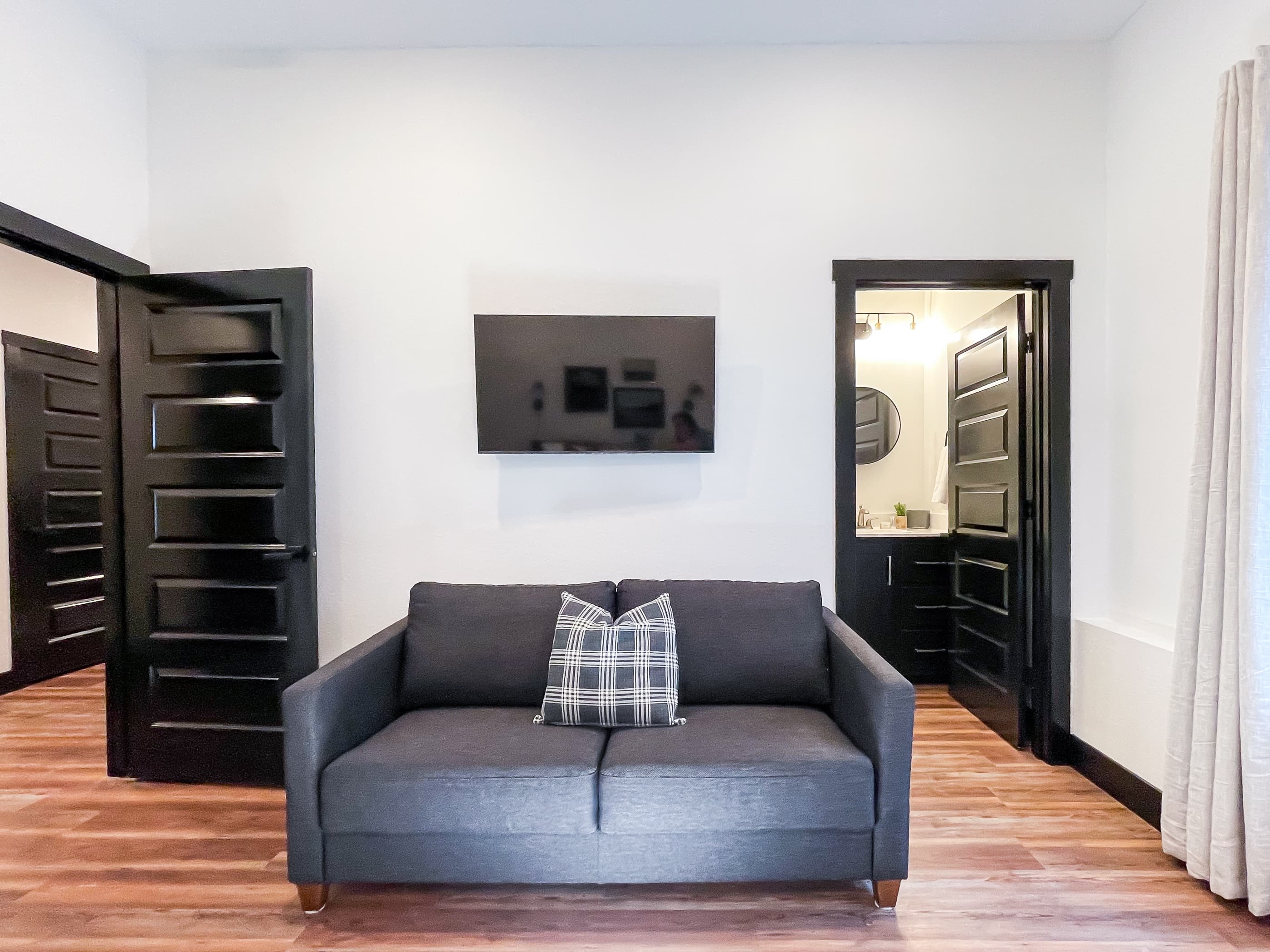 Lower level spacious bedroom with queen sleeper sofa and en suite bathroom