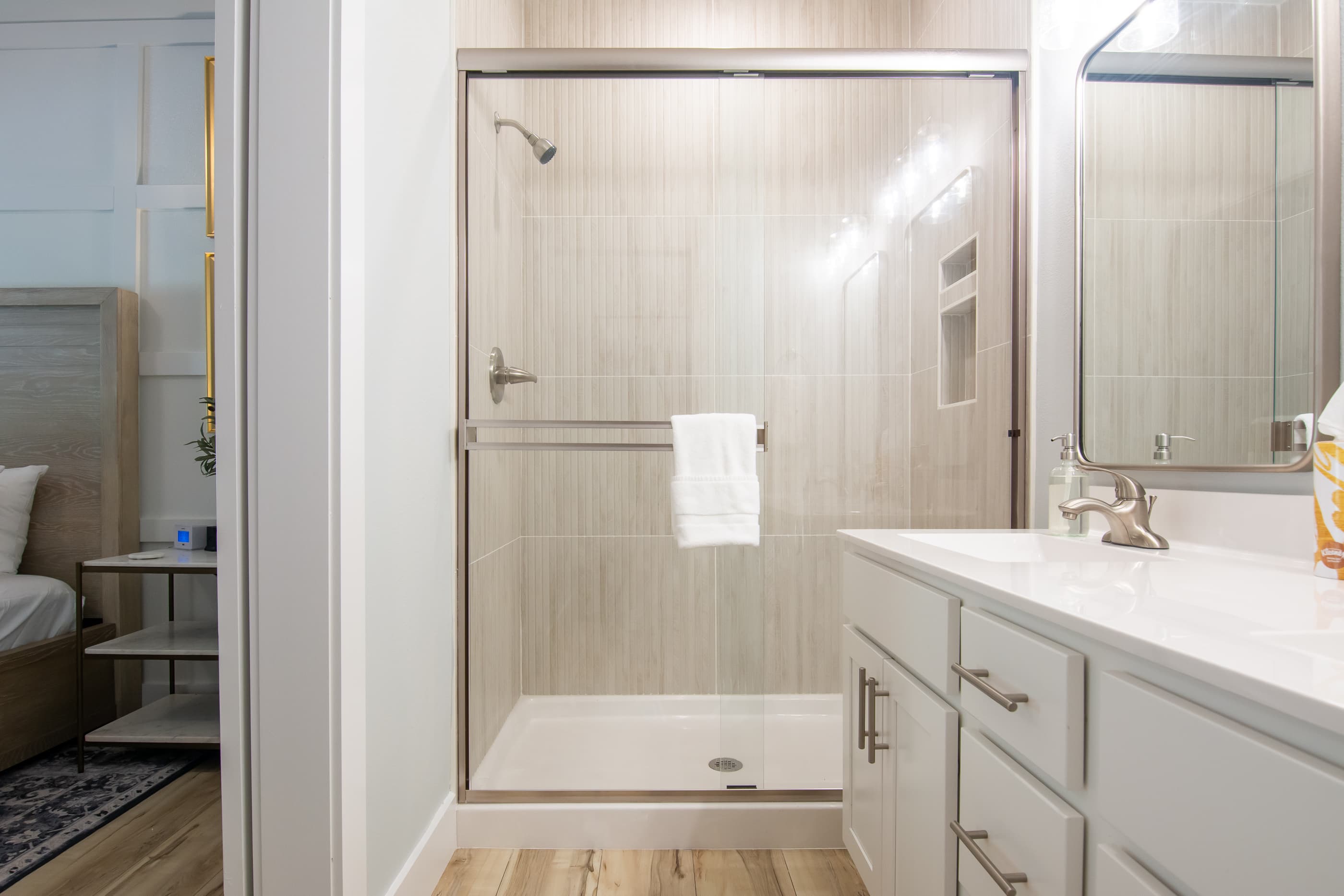 Bedroom 3 en suite bathroom with step in shower and double vanity