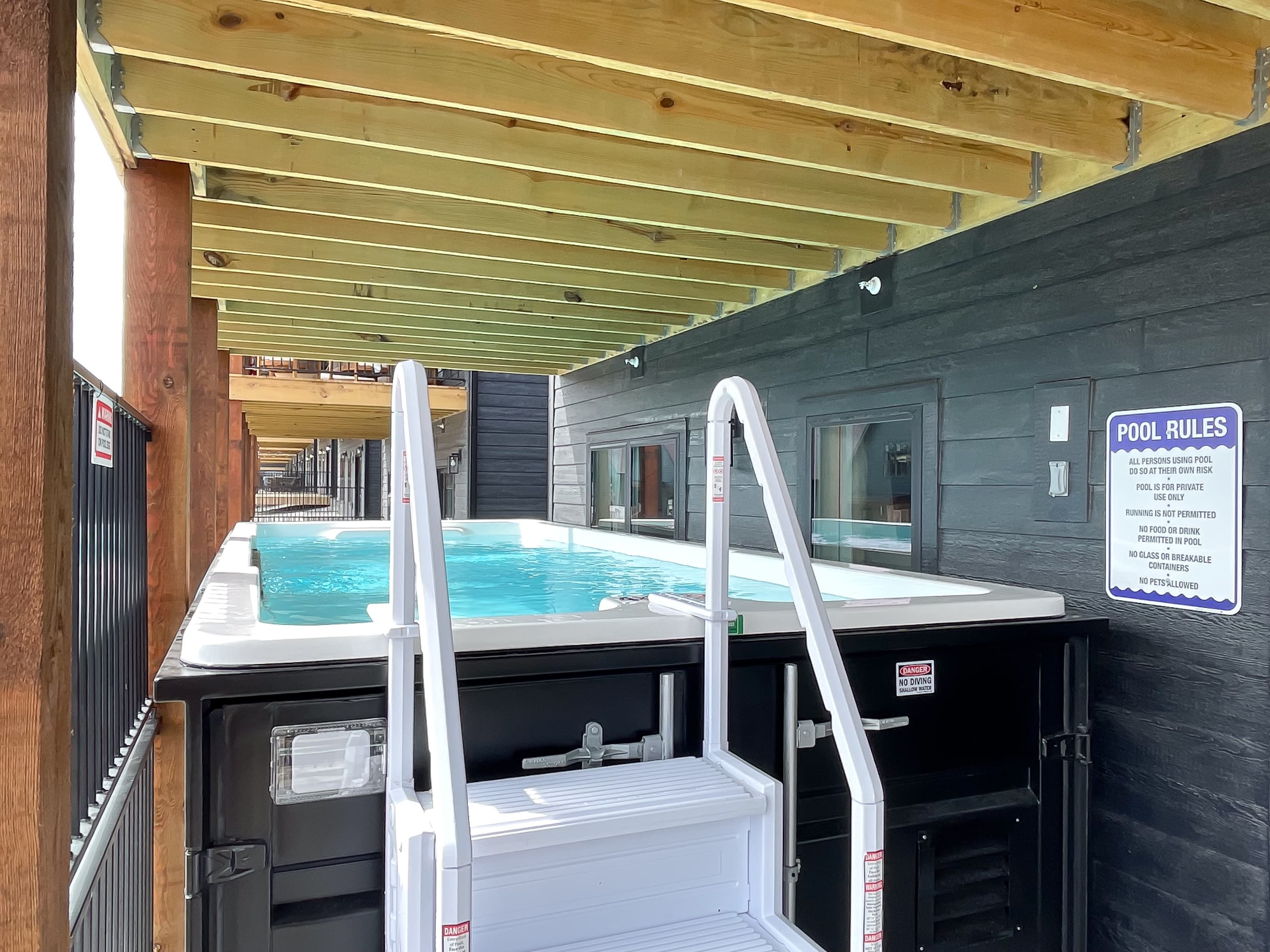 Container pool steps with railing entry