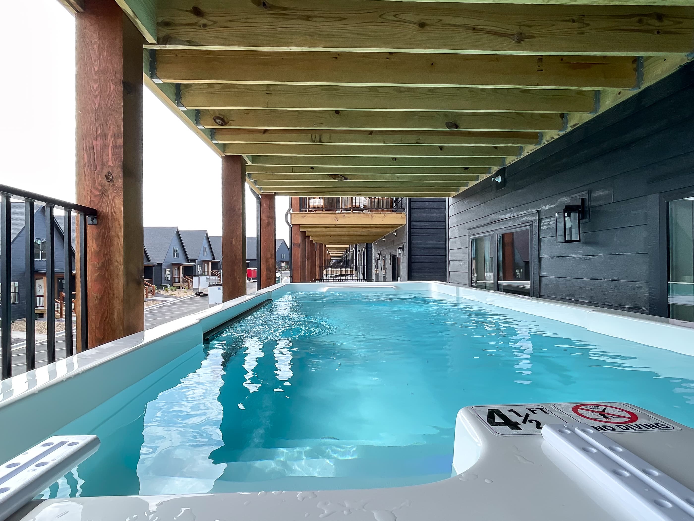Heated container pool on lower level