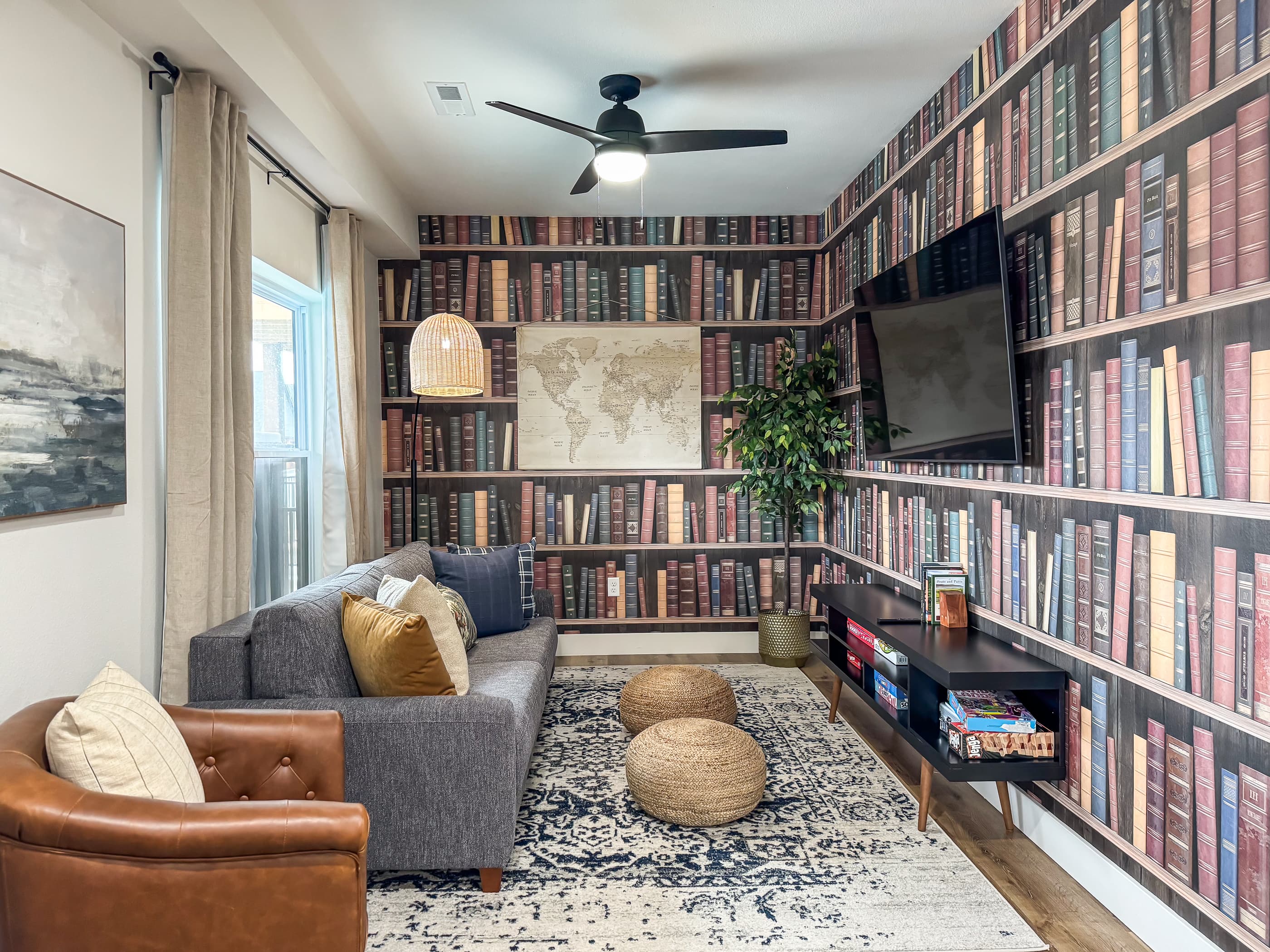 Intriguing decor for the lower level family room with tv, board games, and comfy queen sleeper sofa