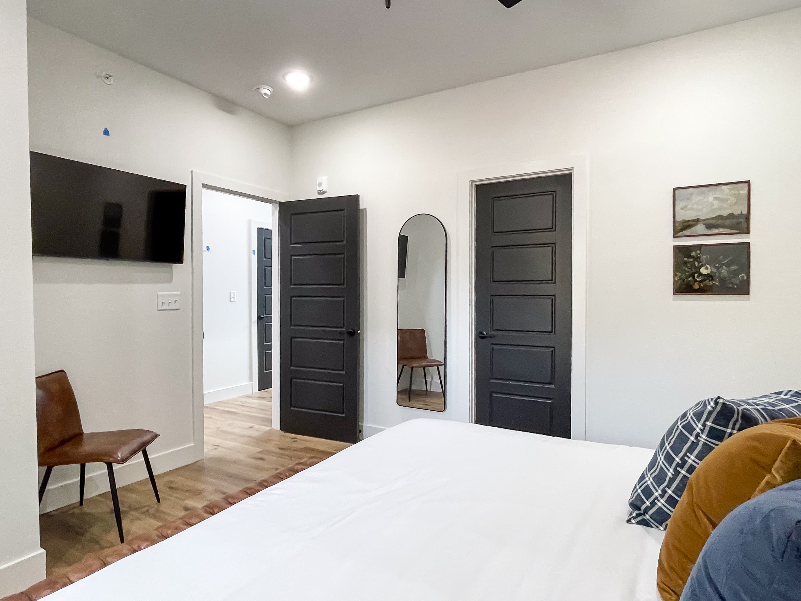 Spacious main level king bedroom with smart tv and en suite bathroom