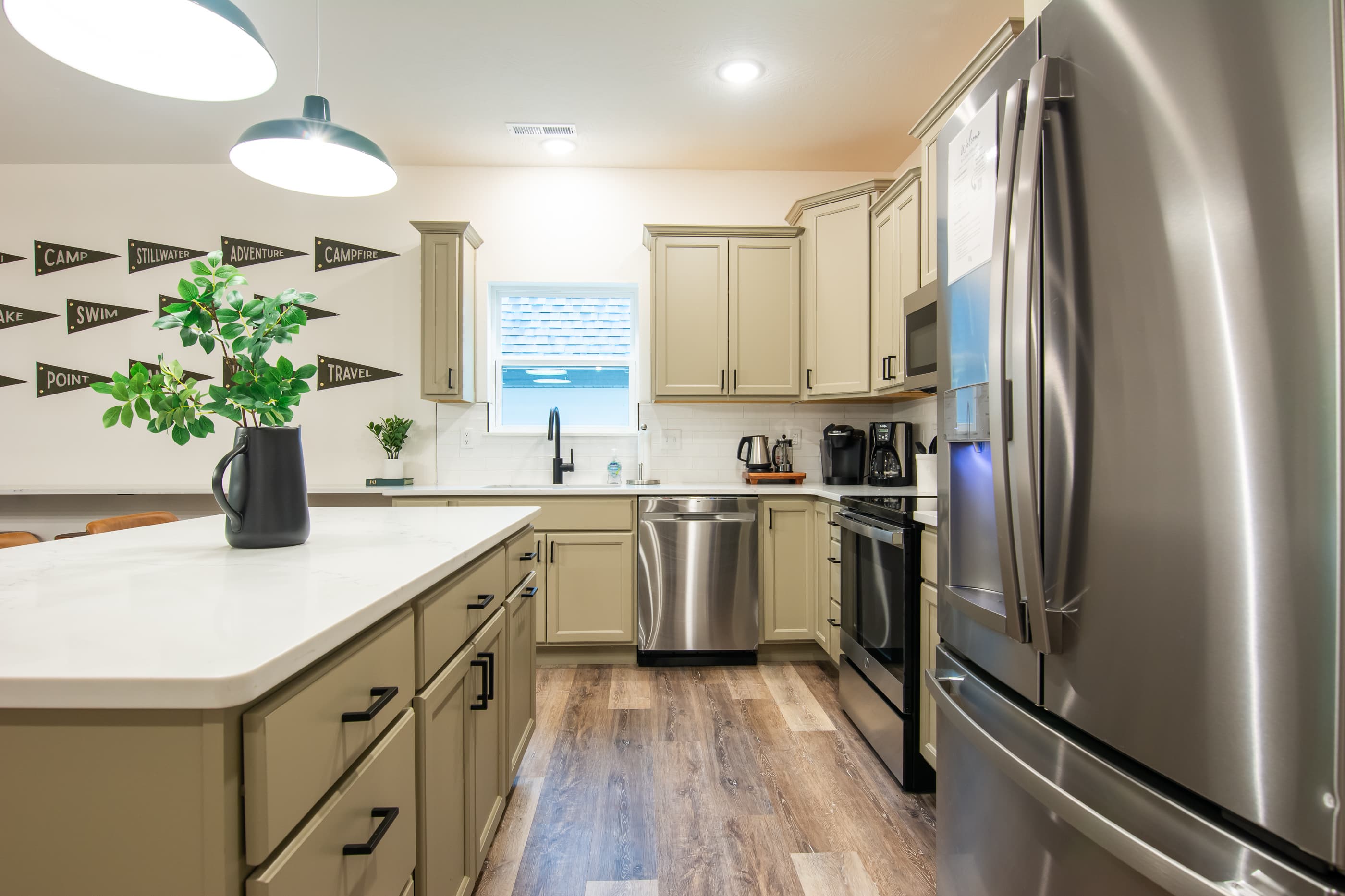Kitchen with island to prepare on or use as more seating