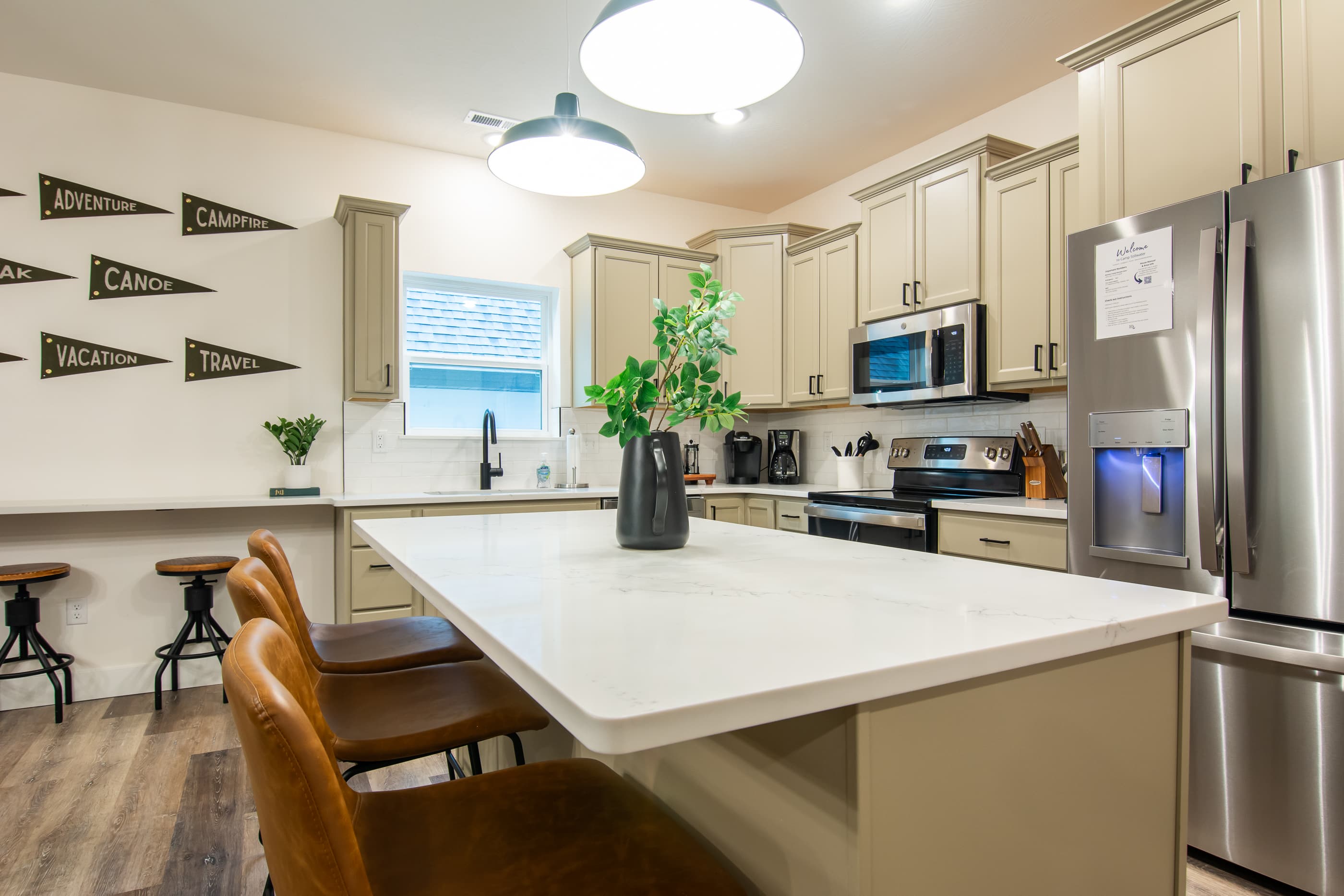 "Lots of seating space in living area and kitchen. Kitchen is amazing with all utensils and appliances needed to feed the family and very upscaled. Large deck to enjoy with grill."Stephanie (AR)