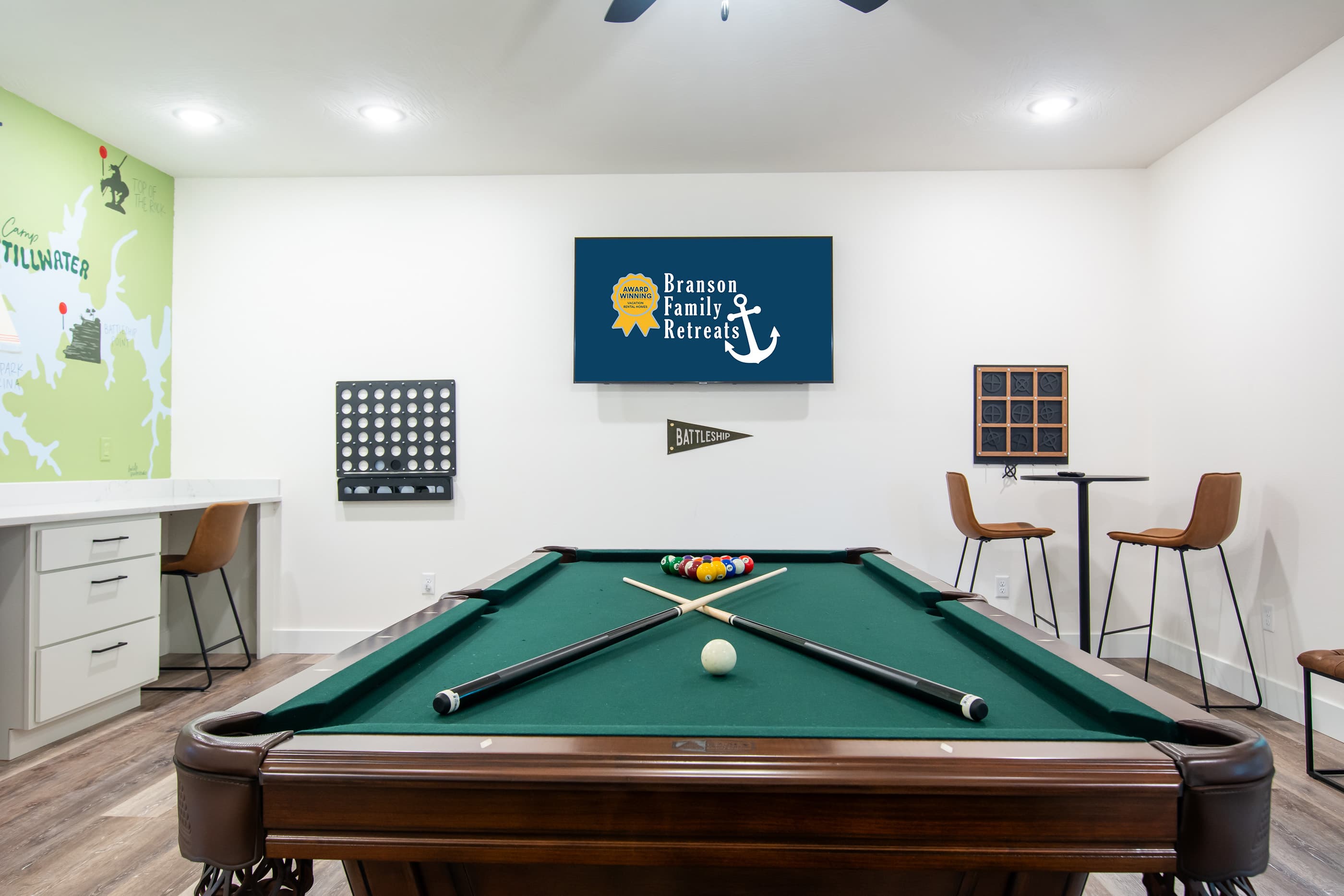 Pool table area with TV to watch while playing