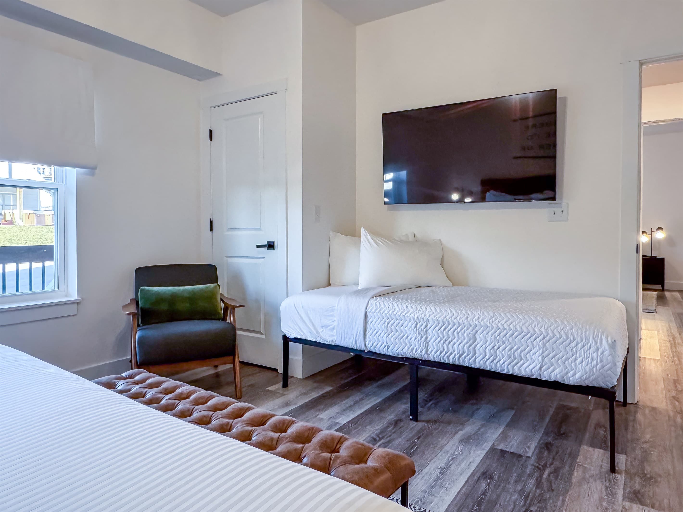 Bedroom 2 (main level): Twin bed with Tv