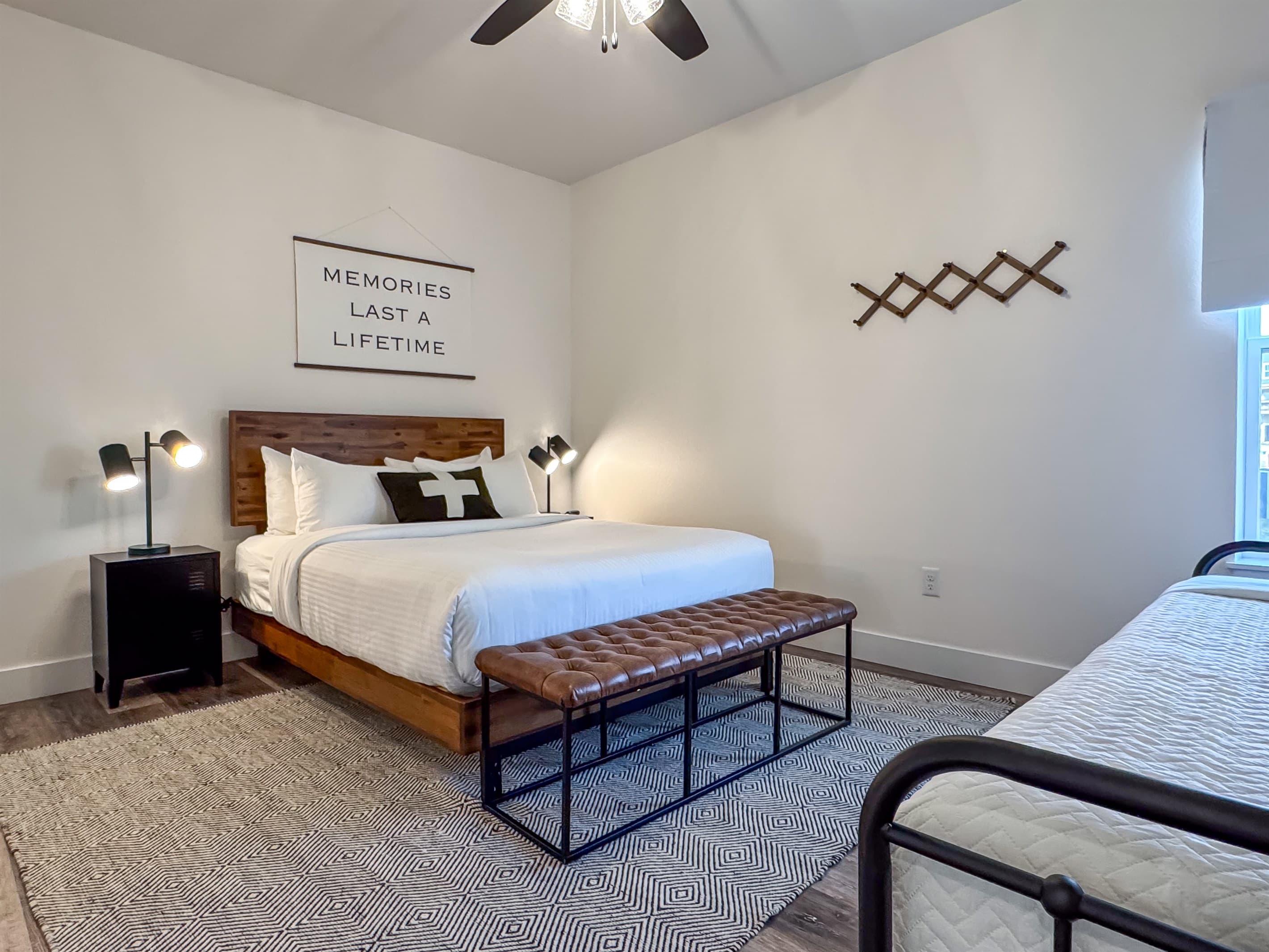 Bedroom 4 (upper level): Queen bed with two nightstands and  twin bed