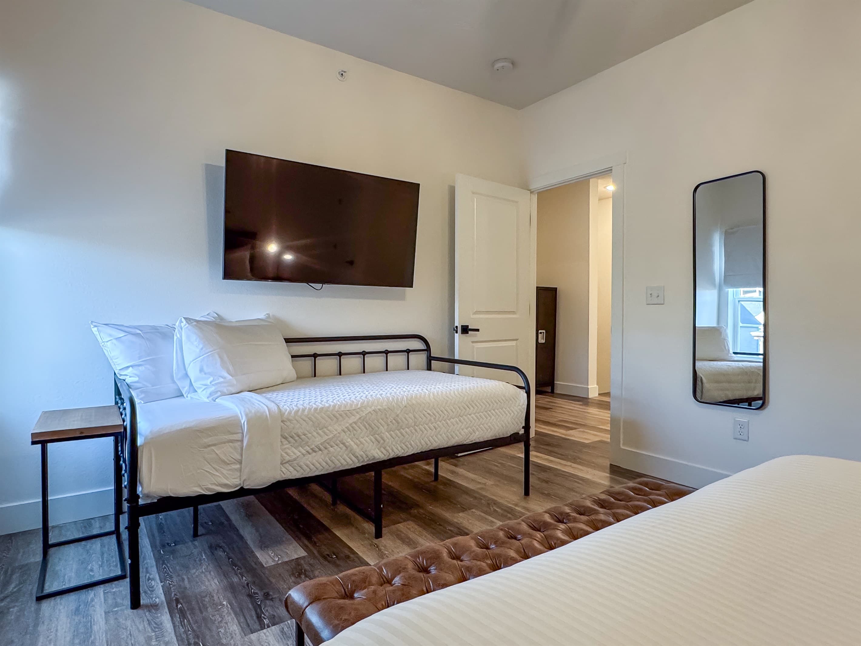 Bedroom 4 (upper level): Twin bed with Tv and full length mirror