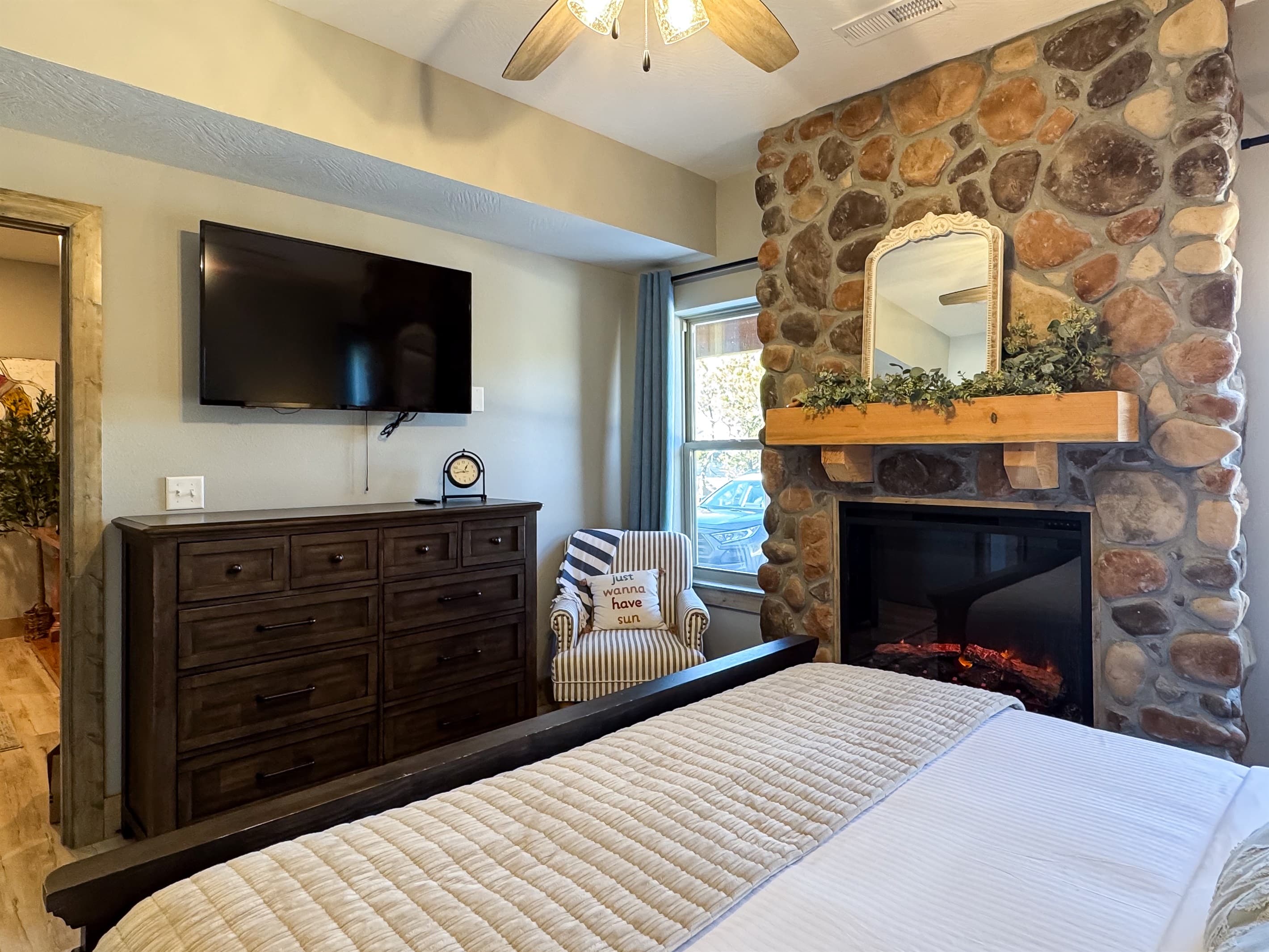 Bedroom 2 Electric fire place, flat screen Tv, and dresser in bedroom ?