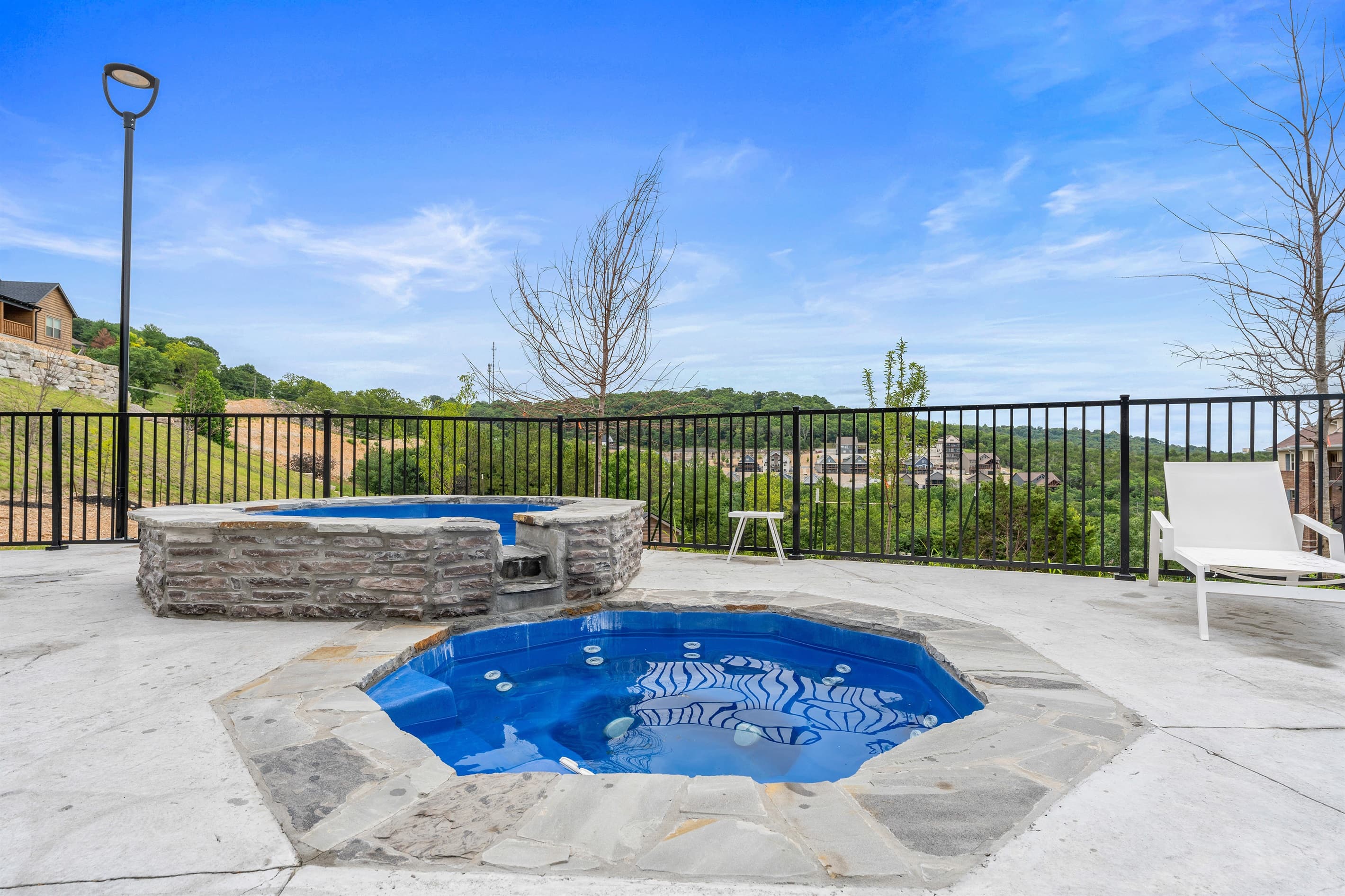 Two hot tubs to enjoy near the outdoor pool area