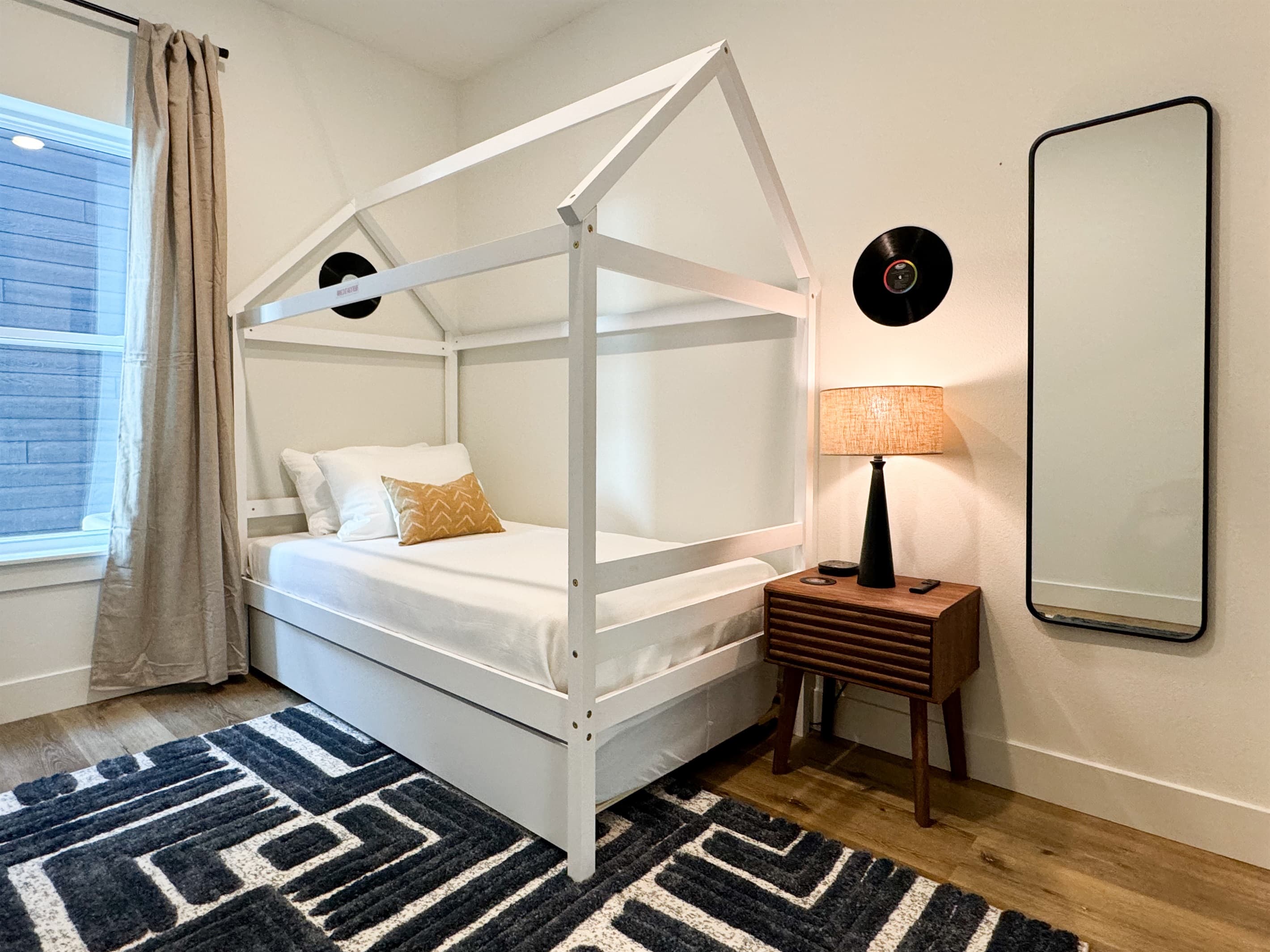 Bedroom 5 (Downstairs) : Twin bed with trundle and a full length mirror