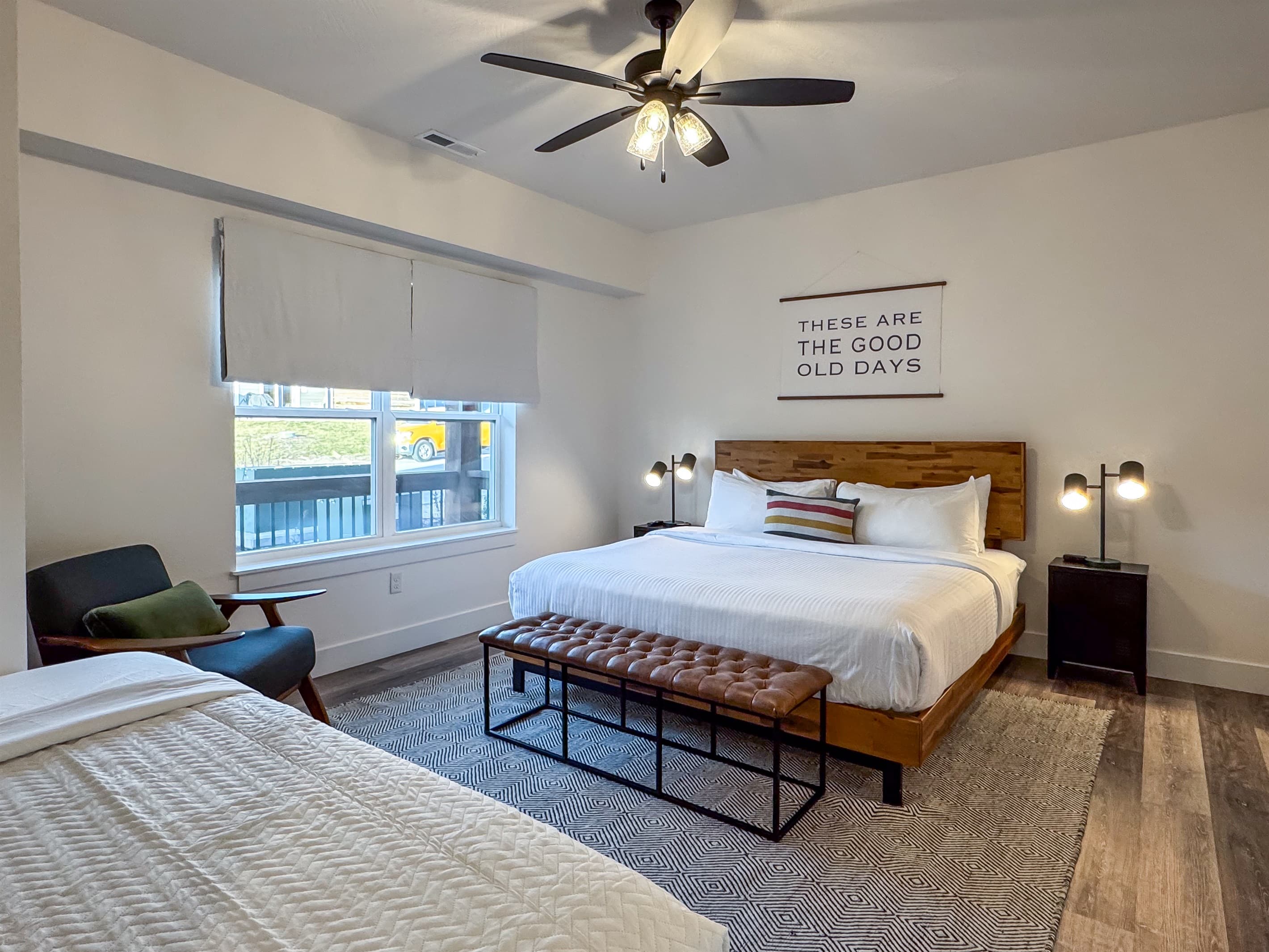 Bedroom 1 (main level): King bed with two nightstands with twin bed