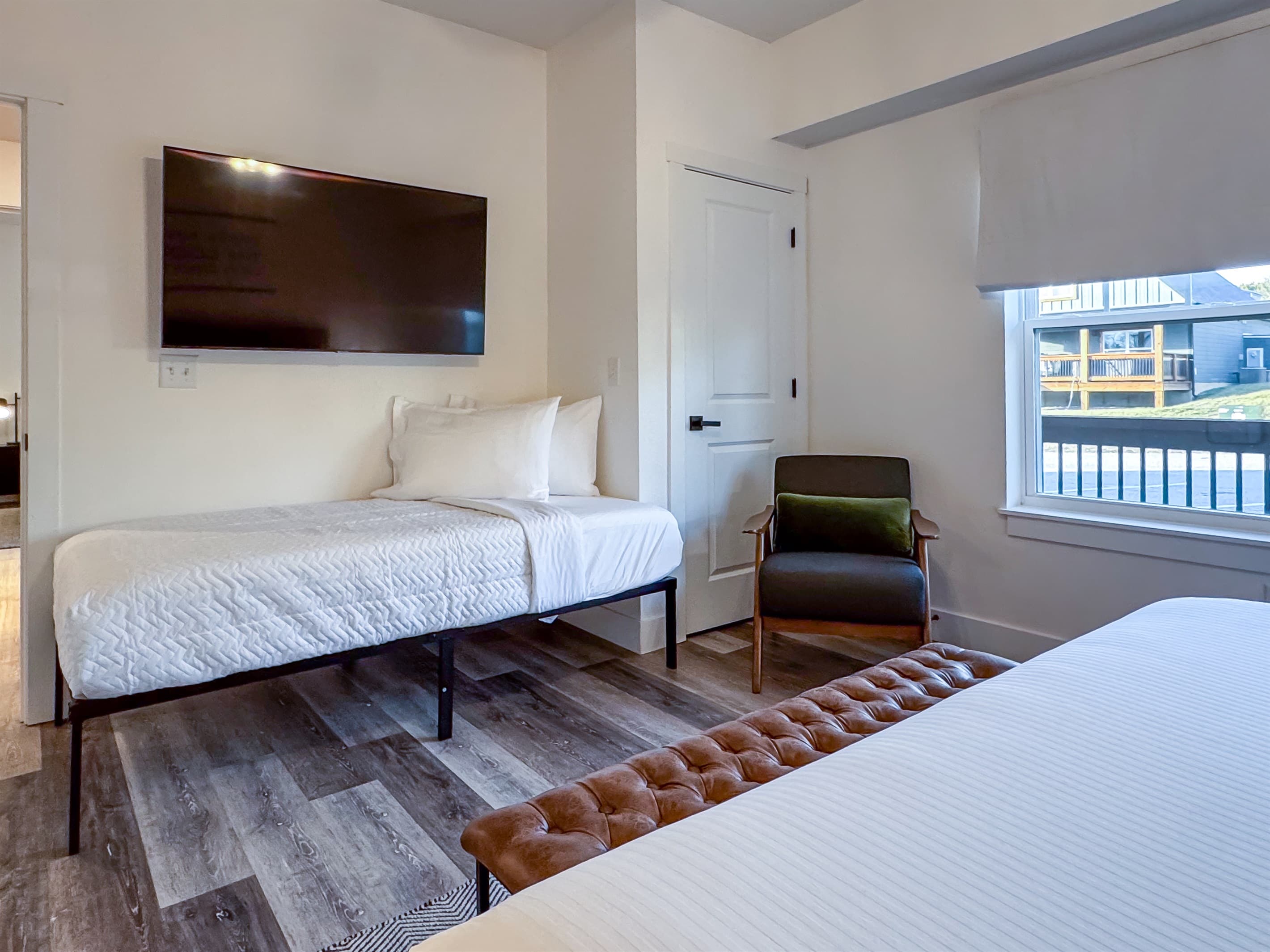 Bedroom 1 (main level): Twin bed and Tv