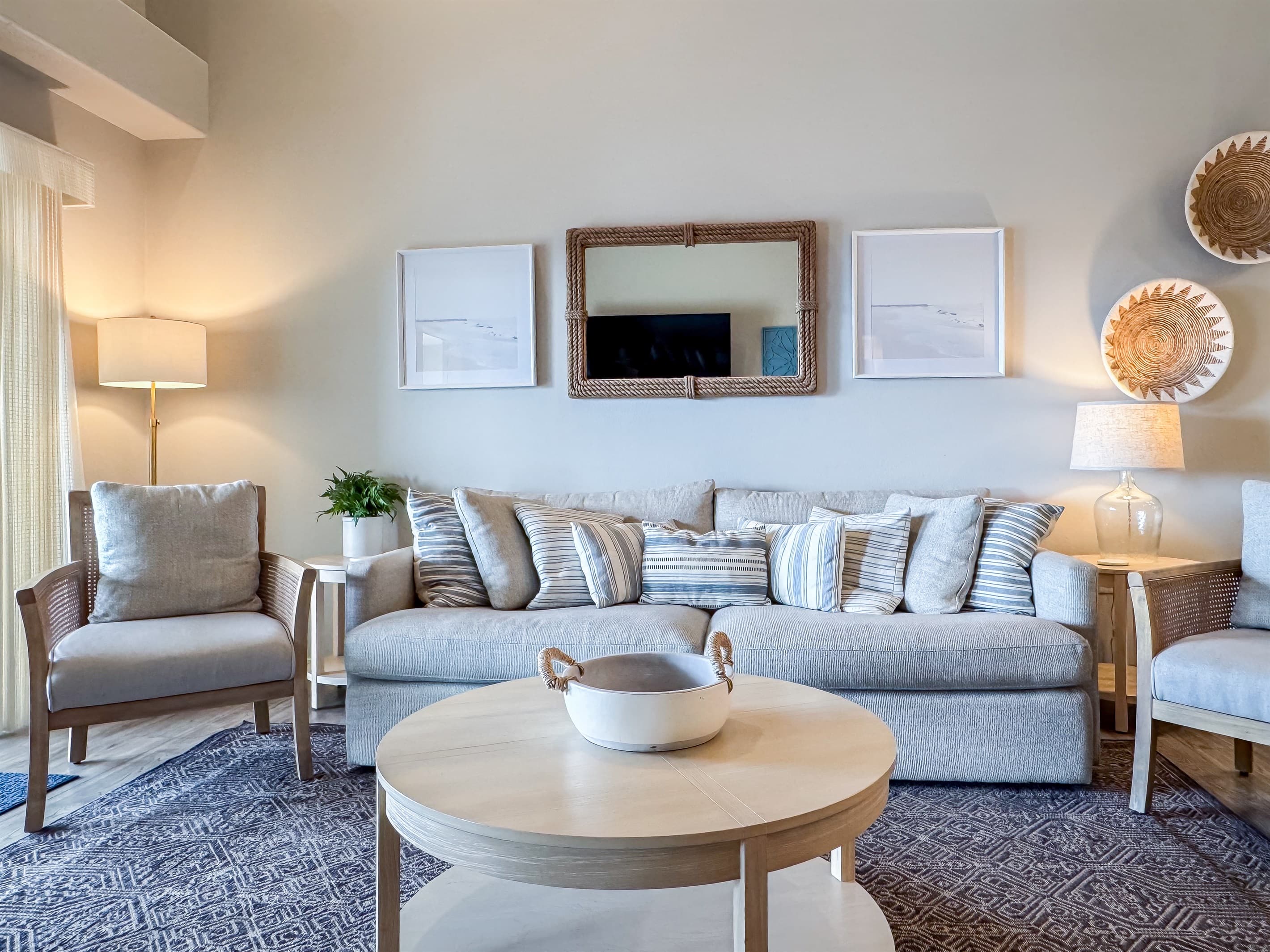 Living room seating with perfect view of the lake and Tv
