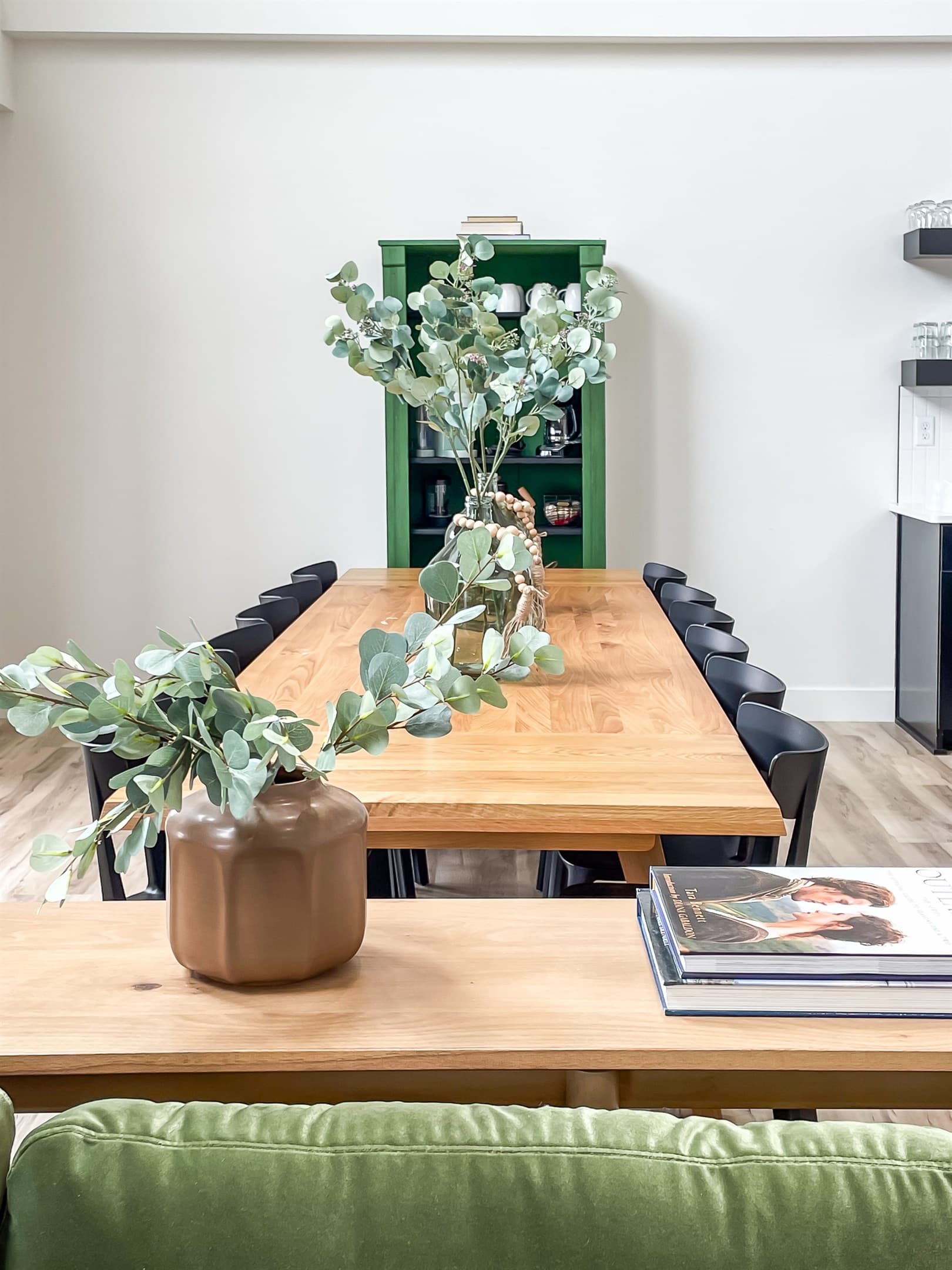 Large dining table with ample seating a gorgeous natural lighting