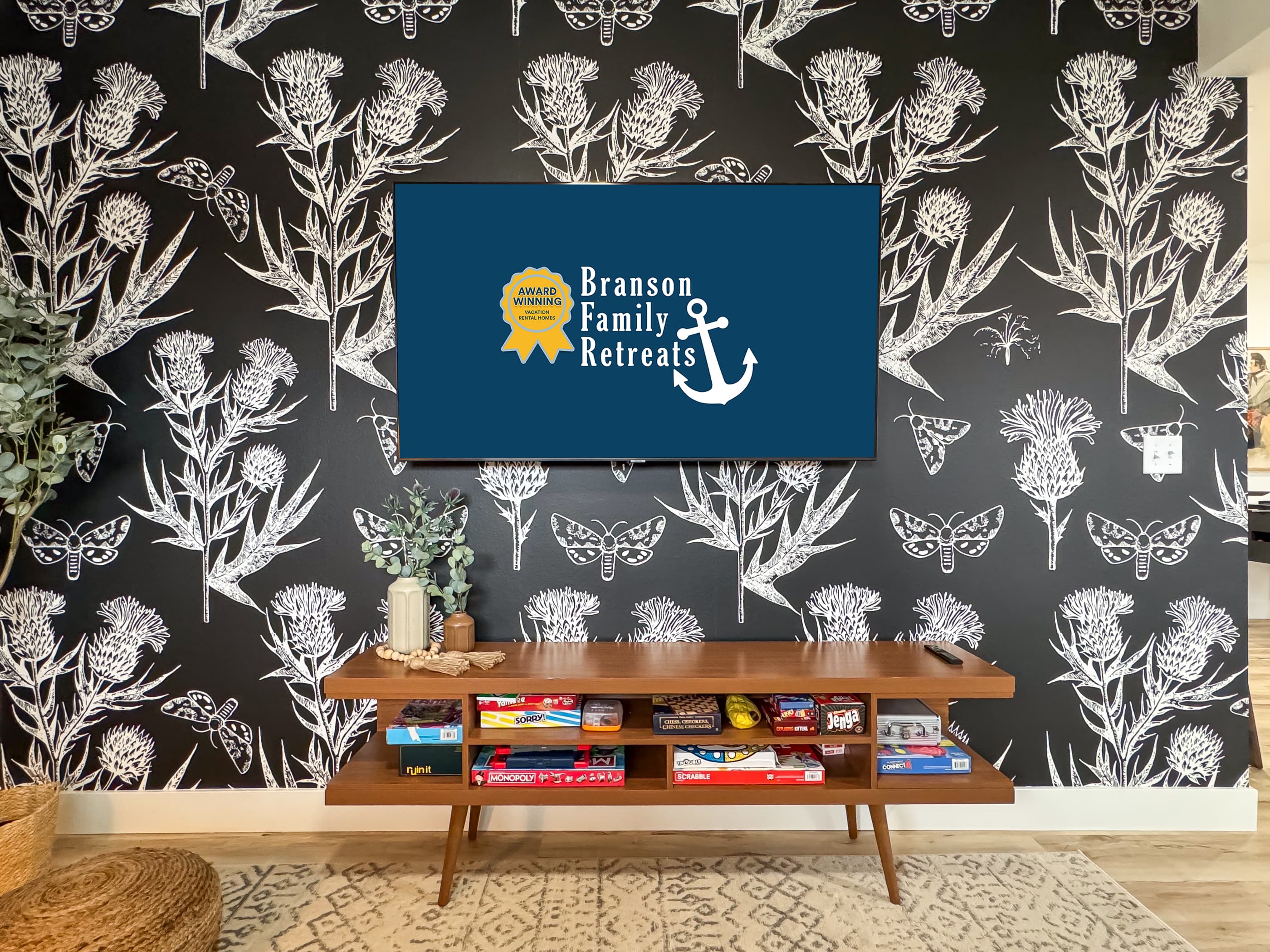 Cozy and inviting lower level family room with board games, tv, and queen sleeper sofa