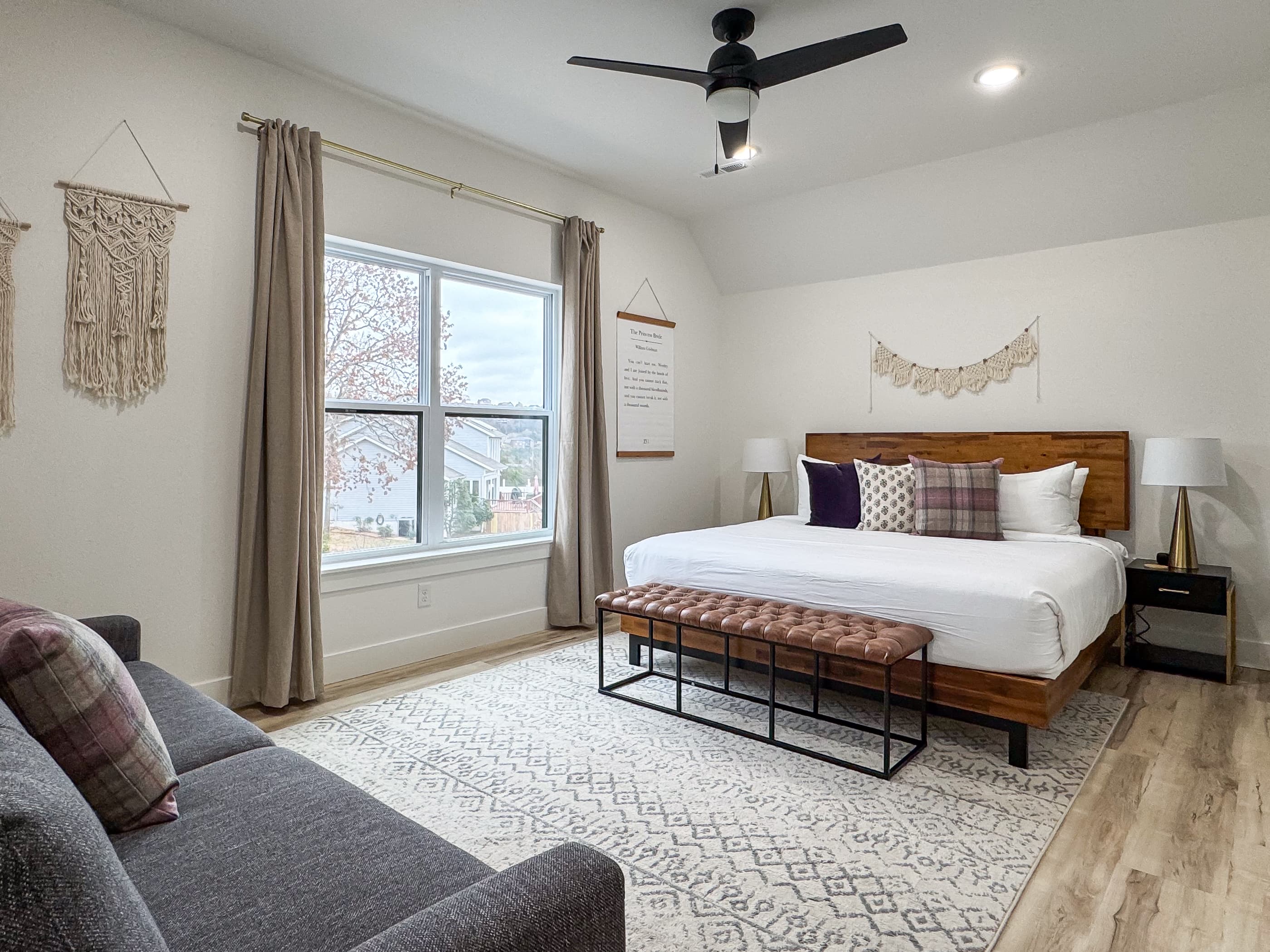 Spacious upper level bedroom with a cozy king bed and king sleeper sofa