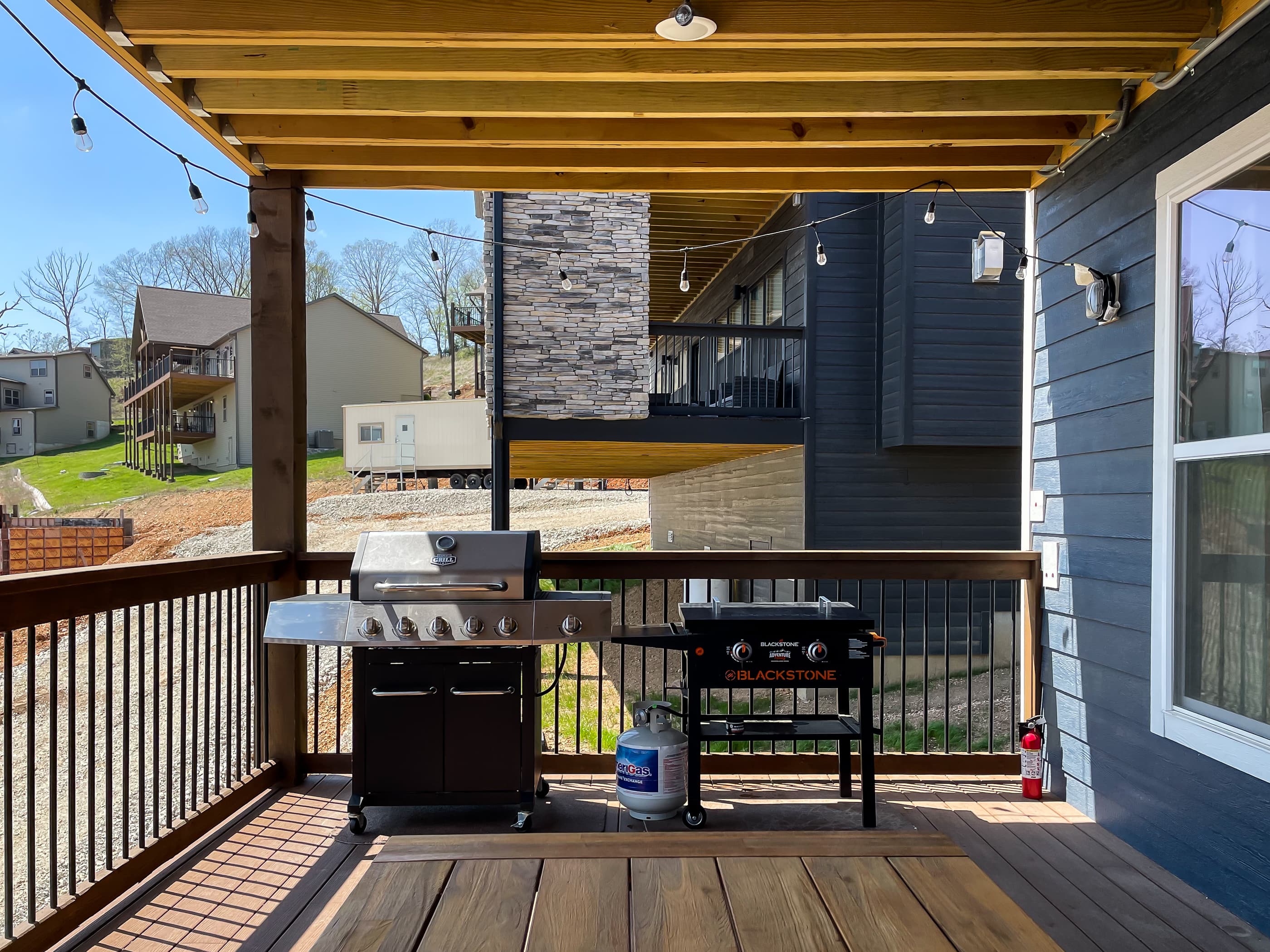 Gas grill and Blackstone griddle on the main level deck