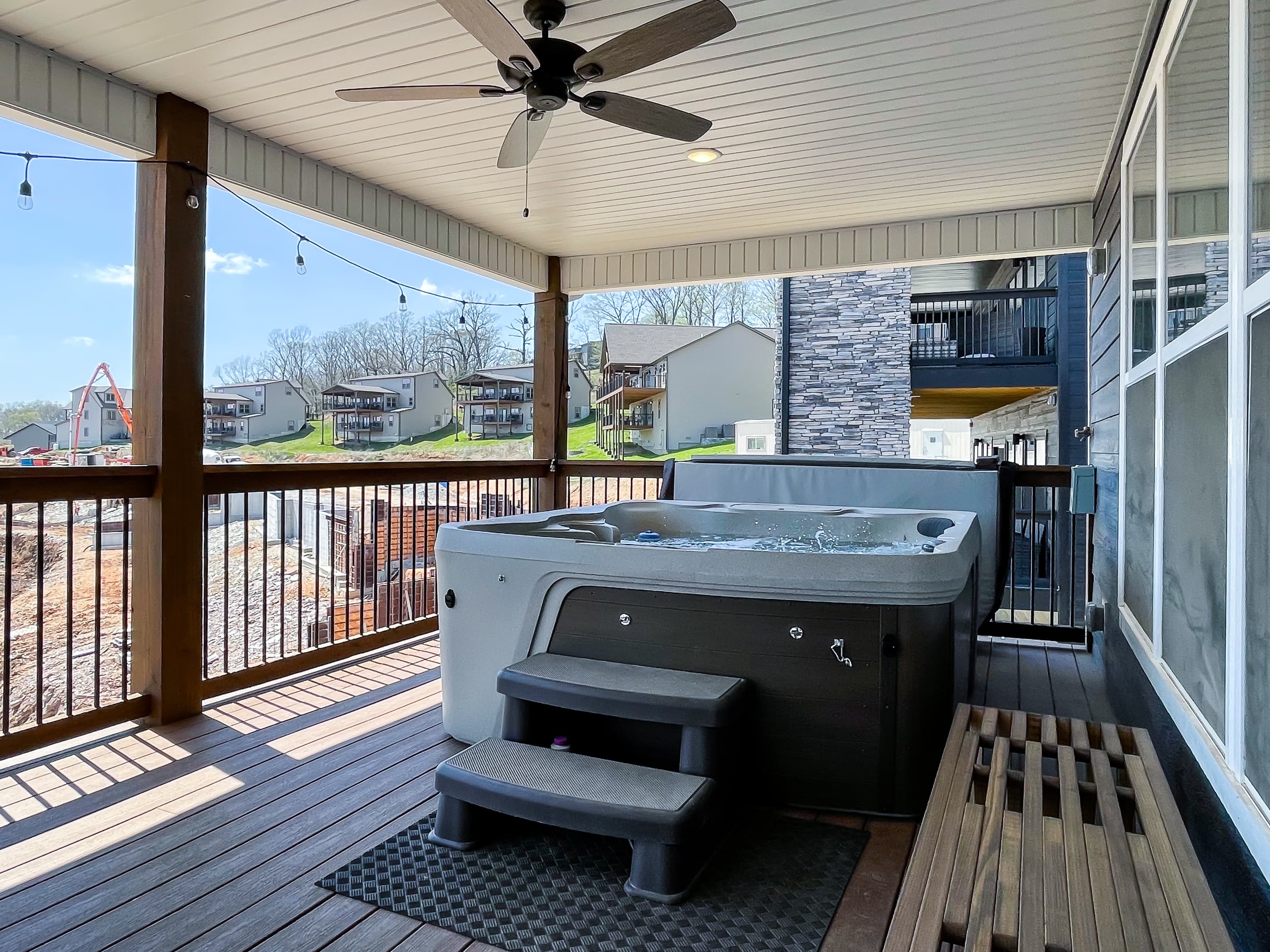 Yes, it took special equipment to get this hot tub on the upper deck for you!