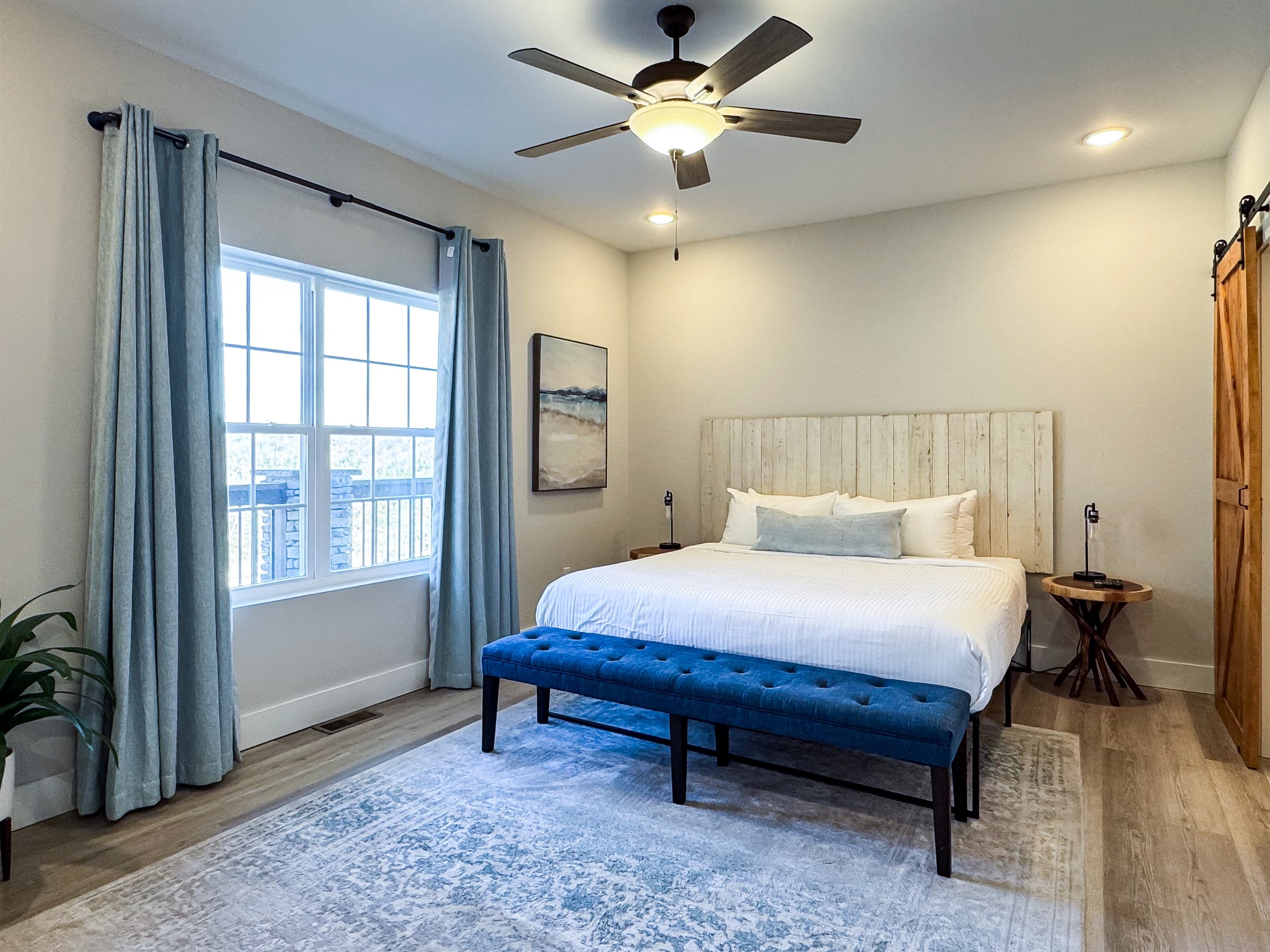 Main level king bedroom with abundant room around the bed