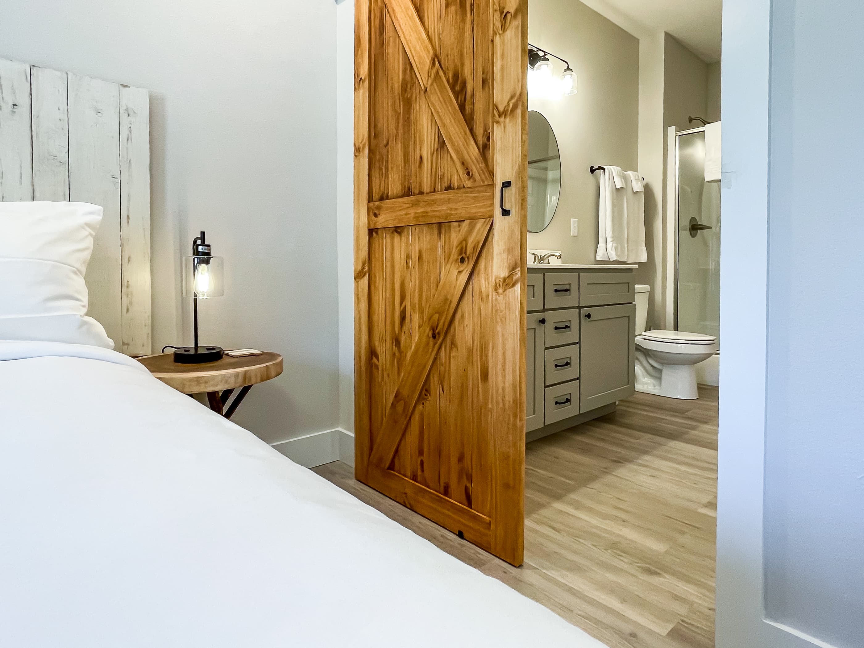 Main level ensuite bathroom with step in shower and built in shower seat