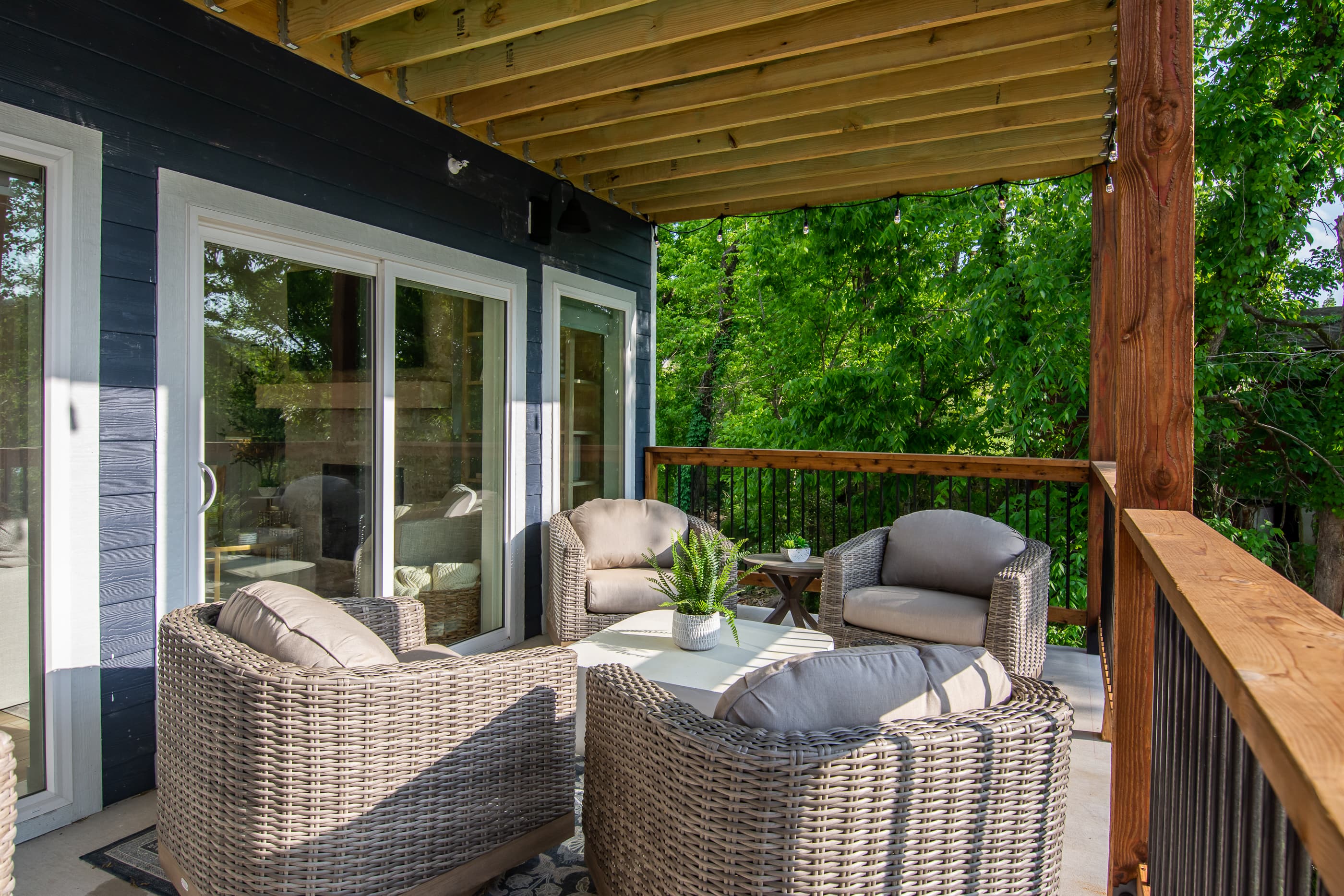 Main level patio with cozy swivel chairs