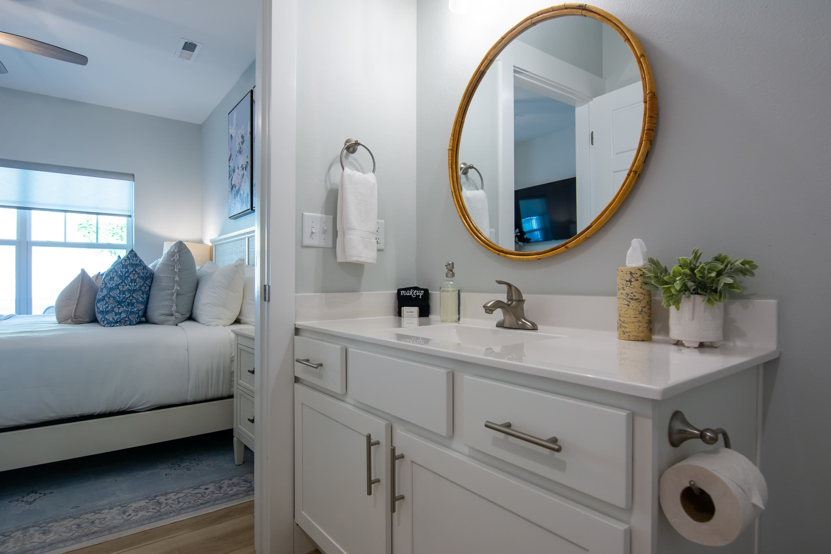 Bedroom 1- well lit bathroom with ample counter space