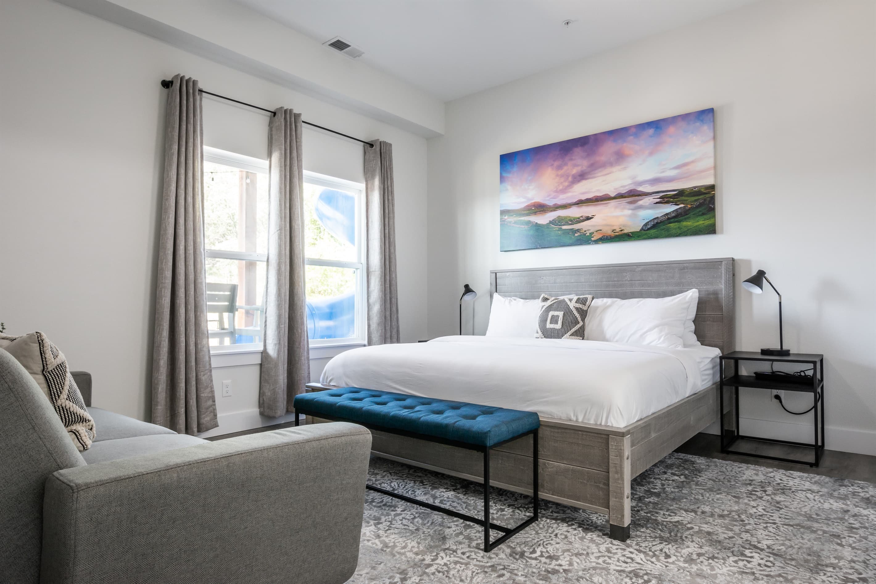 Bedroom 6 (lower level): King bed + Futon and two nightstands with en-suite