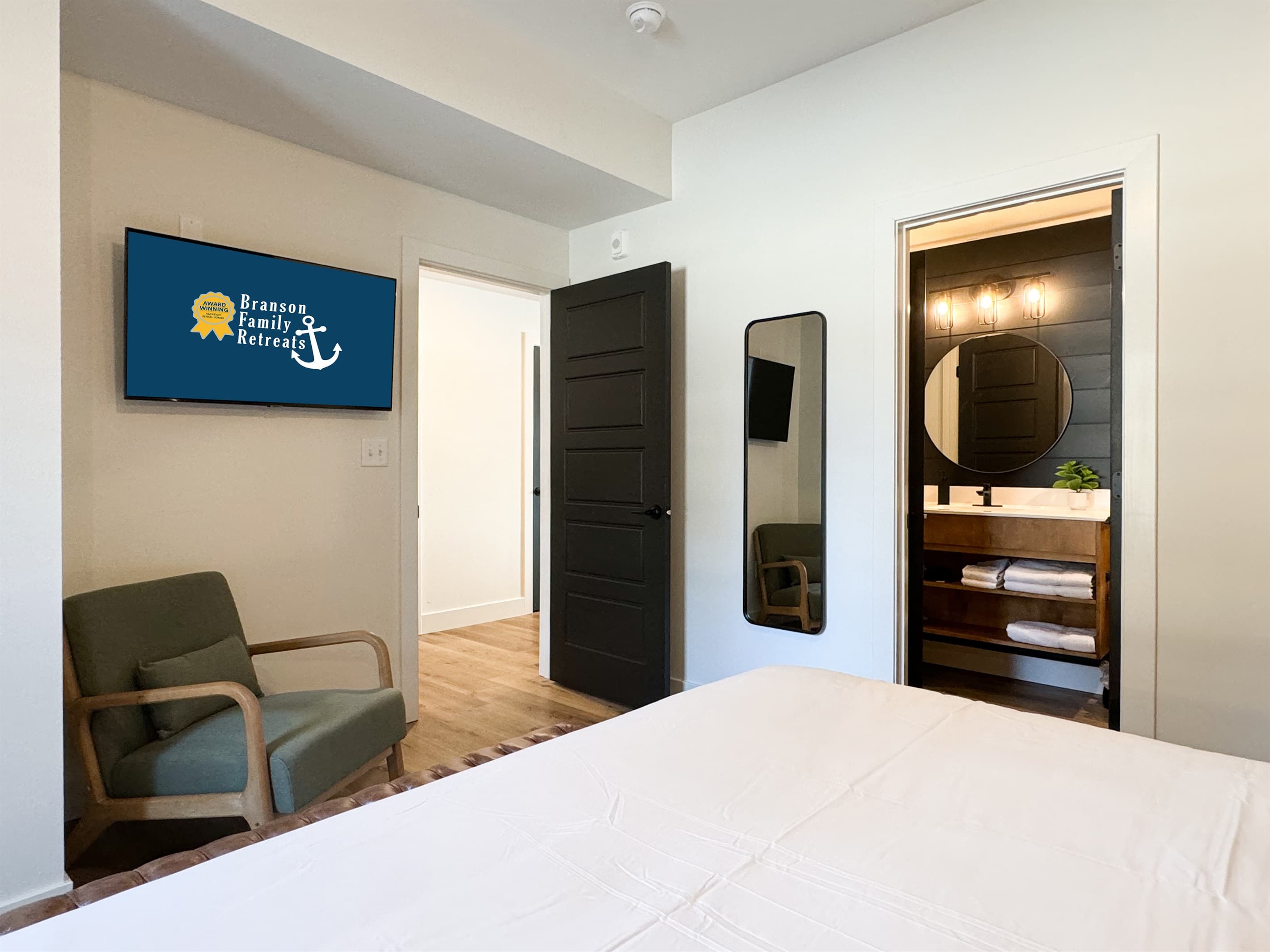 Bedroom 2: Tv, full length mirror, and, entrance to en-suite